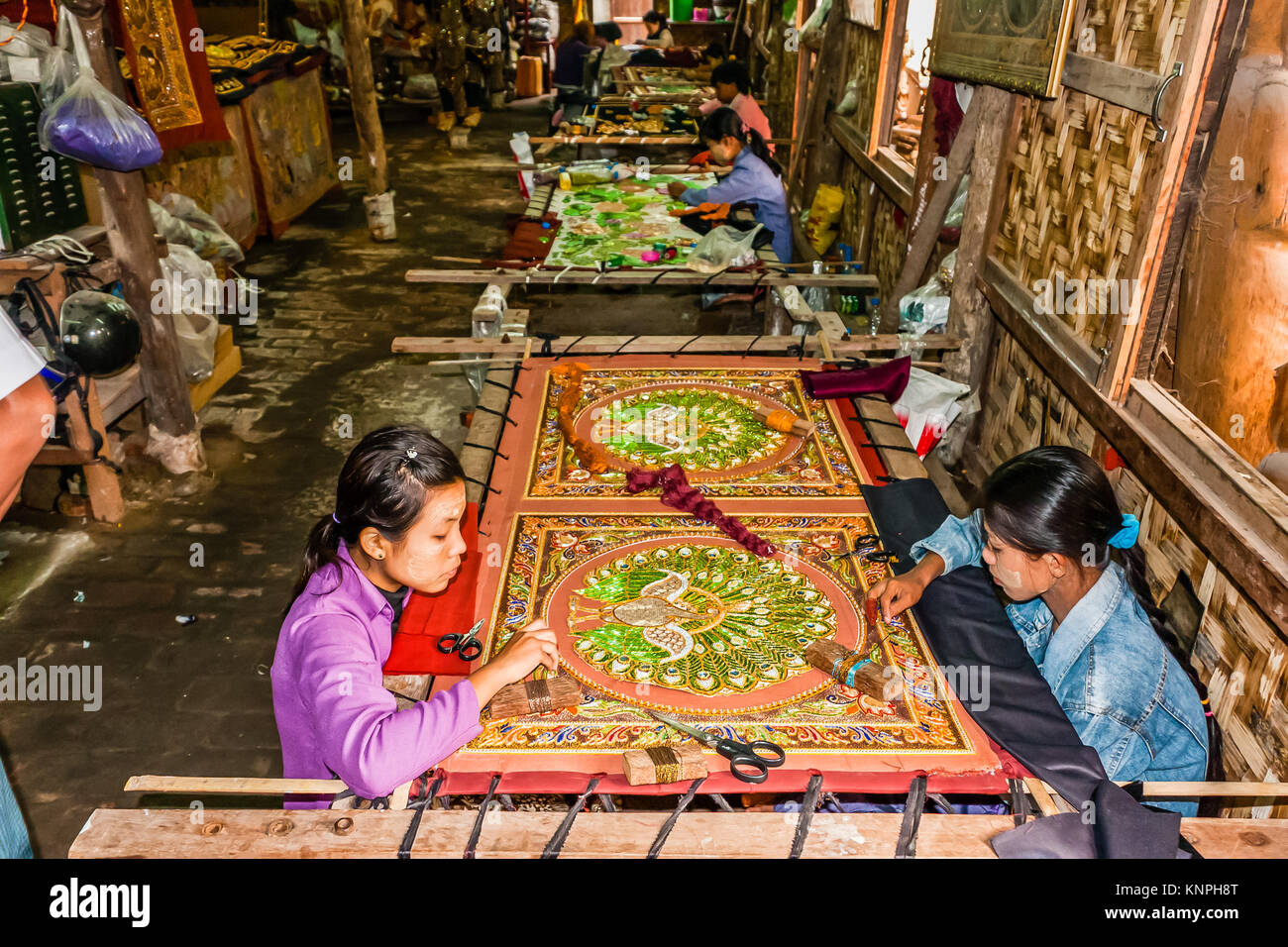 The workers at the embroidery factory, Mandalay, Myanmar Stock Photo