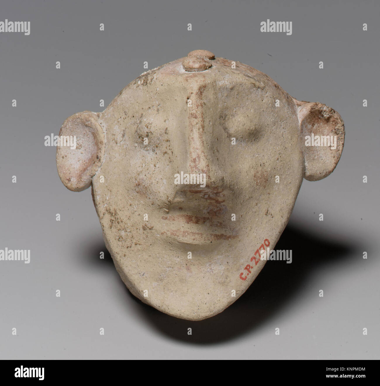 This illustration shows an anthropomorphic mask, depicting human-like ...