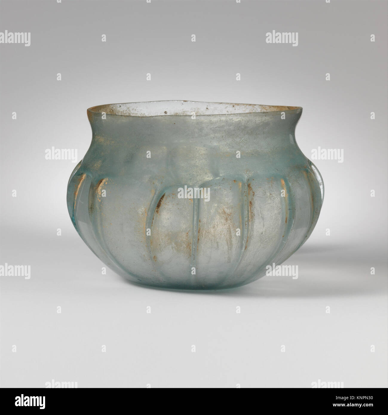 A ribbed glass bowl from the Metropolitan Museum of Art with vertical ...