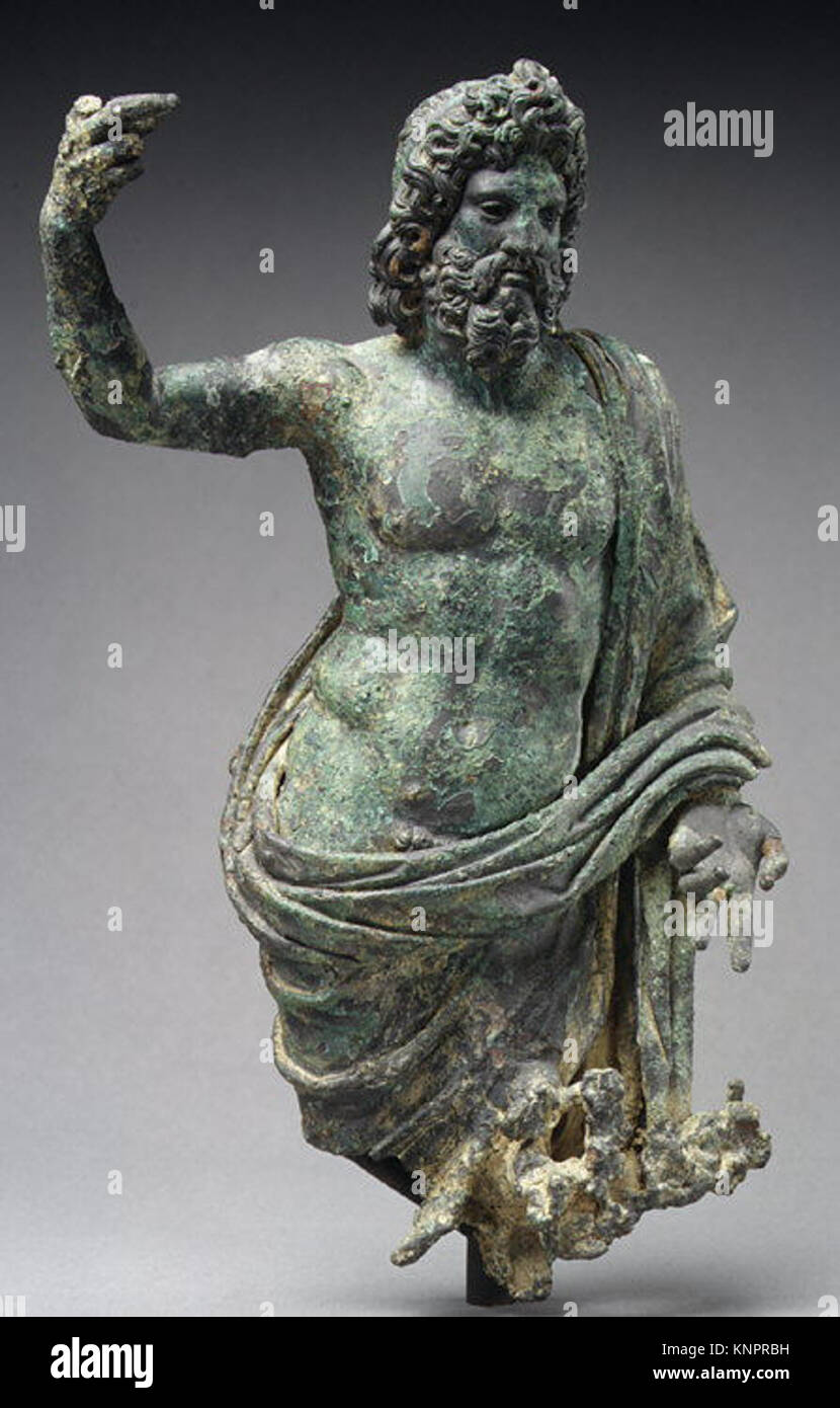 Roman Kin A small bronze statuette depicting Jupiter, the Roman king of gods ...