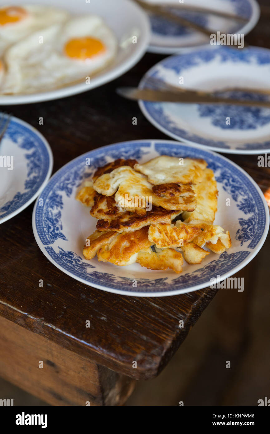 Fried Halloumi cheese for breakfast in Crete Greece Stock Photo