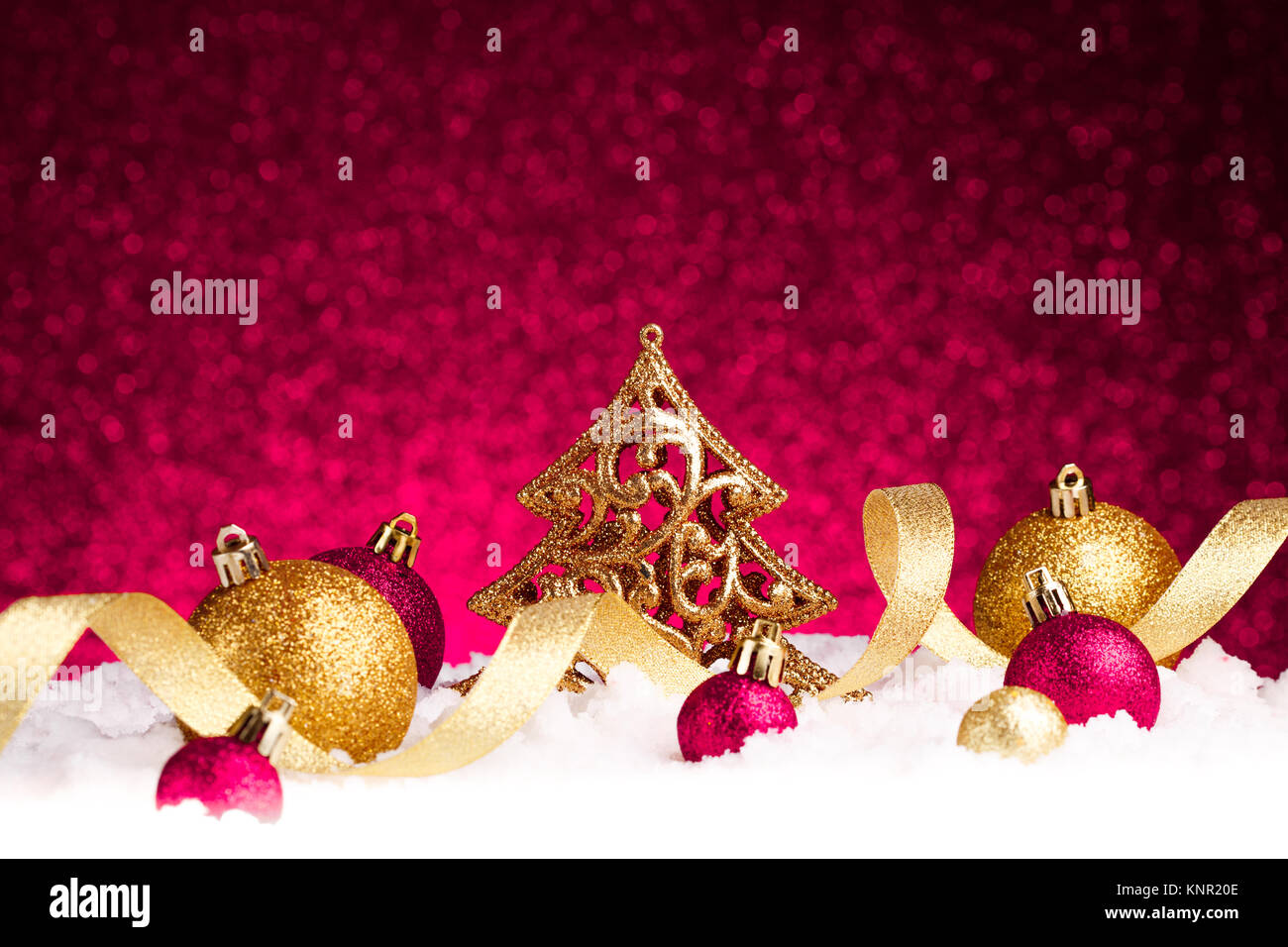 christmas fir tree decoration on purple glitter background Stock Photo ...
