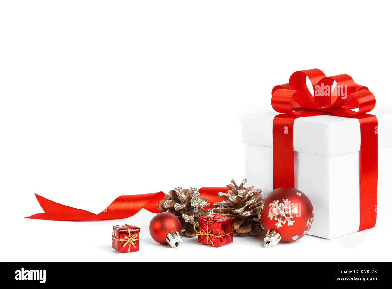christmas gift with red balls bow isolated on white background Stock ...