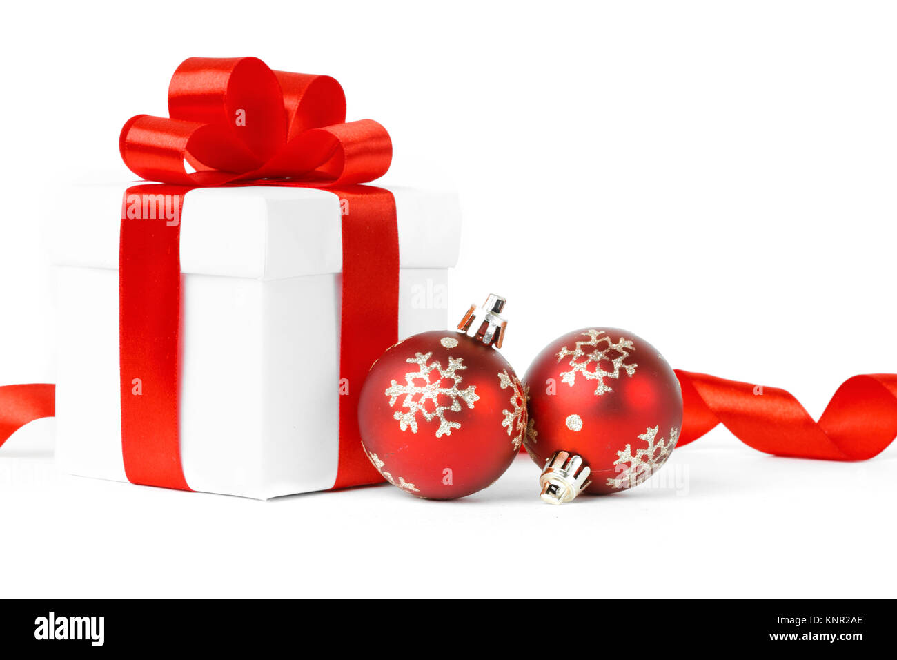 christmas gift with red balls bow isolated on white background Stock ...