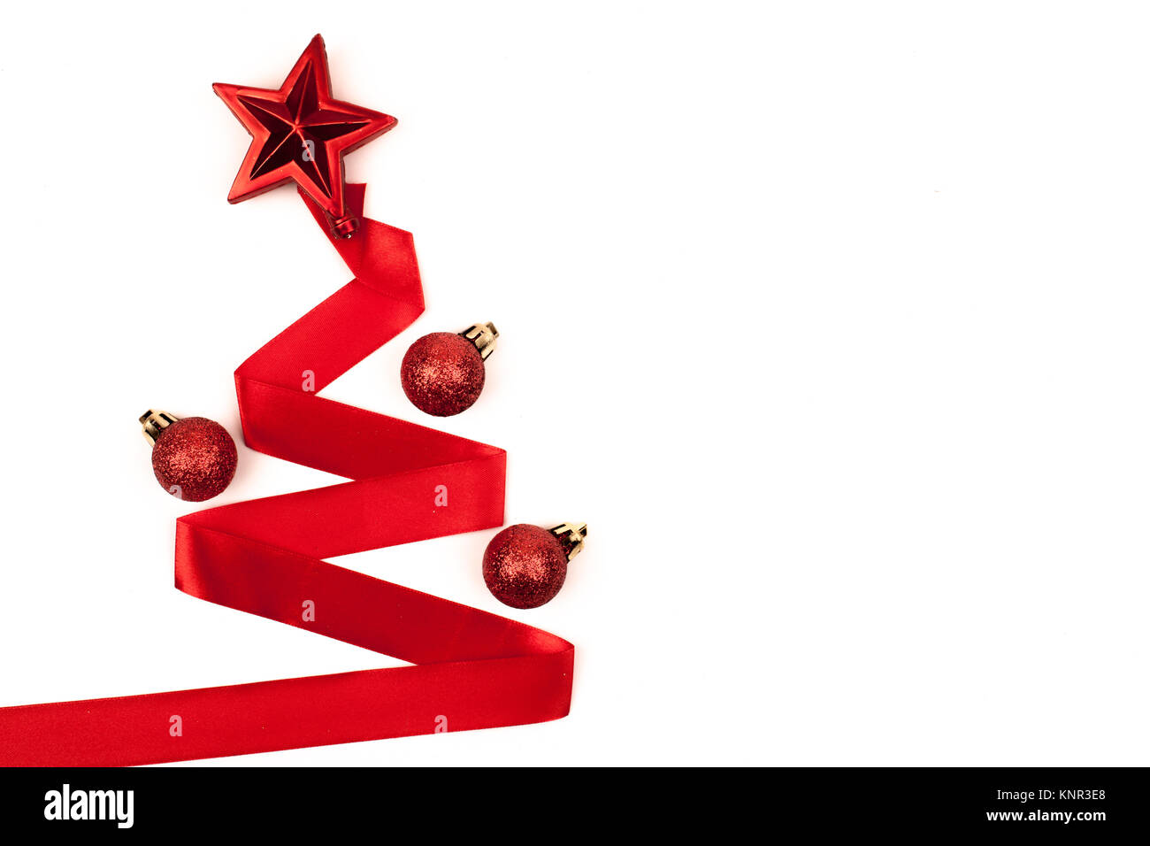 Christmas tree from ribbon isolated on white background Stock Photo - Alamy