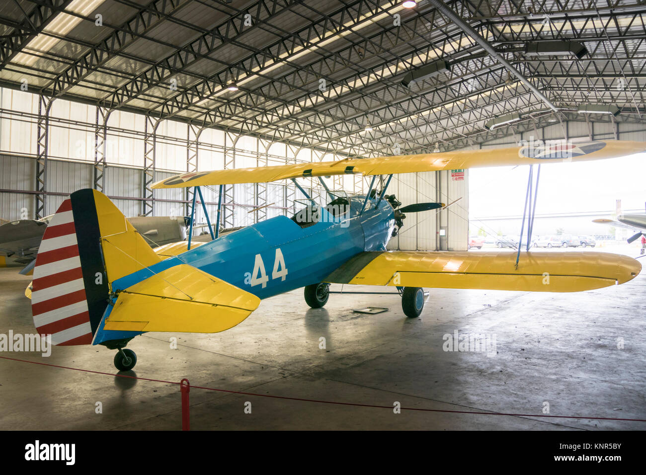 Boeing Stearman PT-17 Kaydet aircraft in the hangar at the Imperial War Museum, Duxford, England, UK Stock Photo