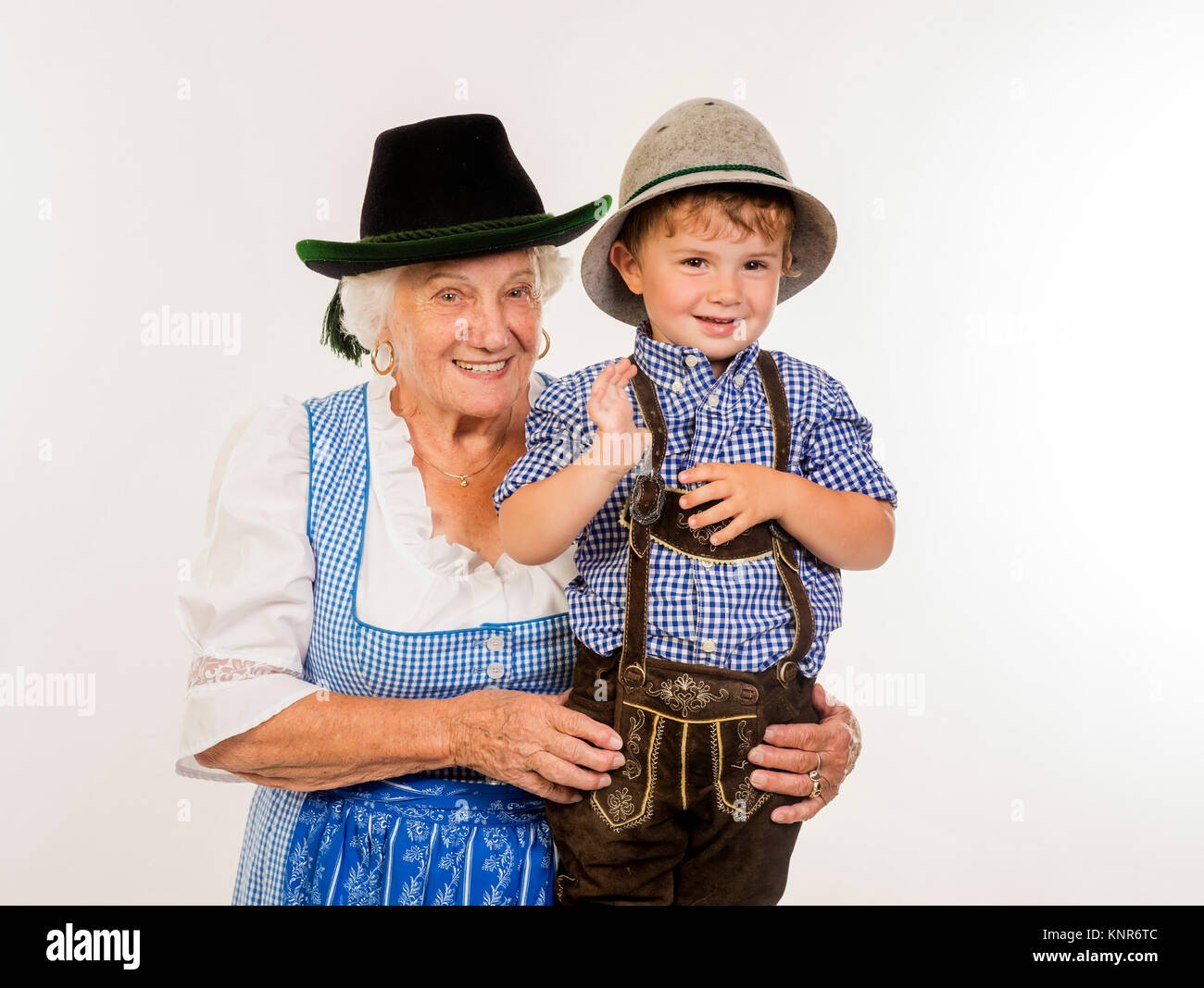 Seniorin und Bub in Tracht - older woman and little boy in traditional costume Stock Photo