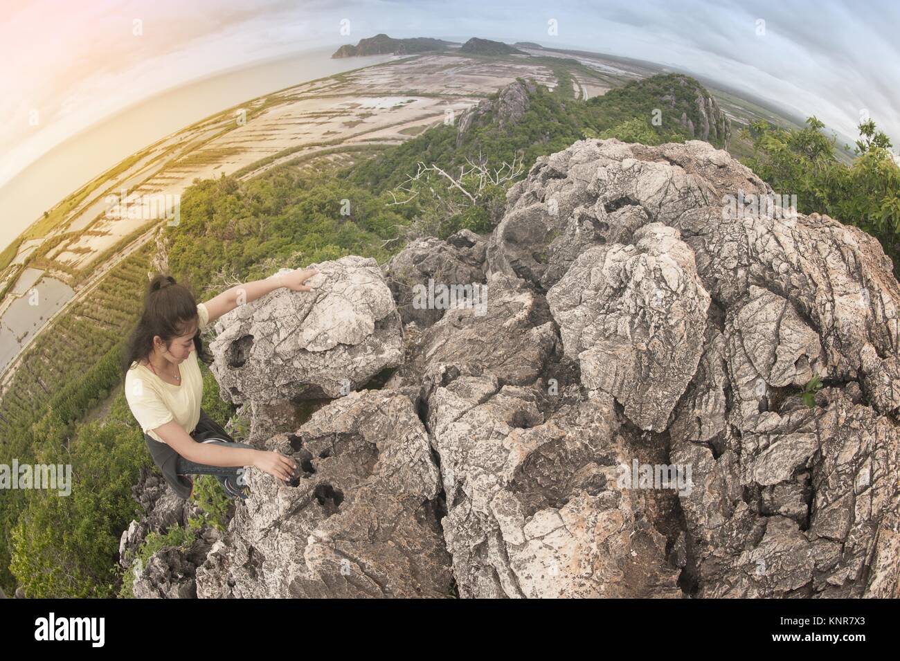 Pretty Asian woman hiking and climbing in mountains Stock Photo - Alamy