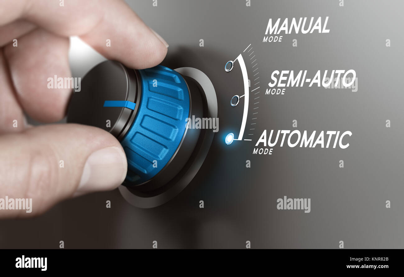 Hand turning a knob over grey background and selecting the automatic mode. Manufacturing process automation or automatic testing concept. Composite im Stock Photo