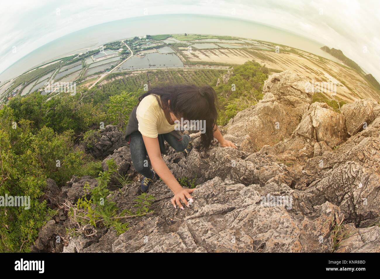 Pretty Asian woman hiking and climbing in mountains Stock Photo - Alamy