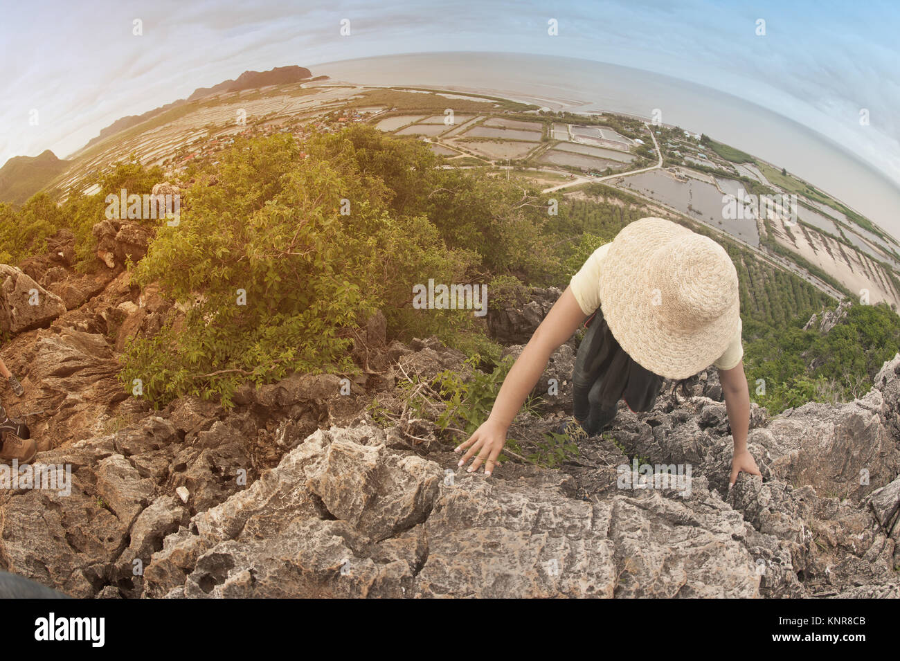 Pretty Asian woman hiking and climbing in mountains Stock Photo - Alamy