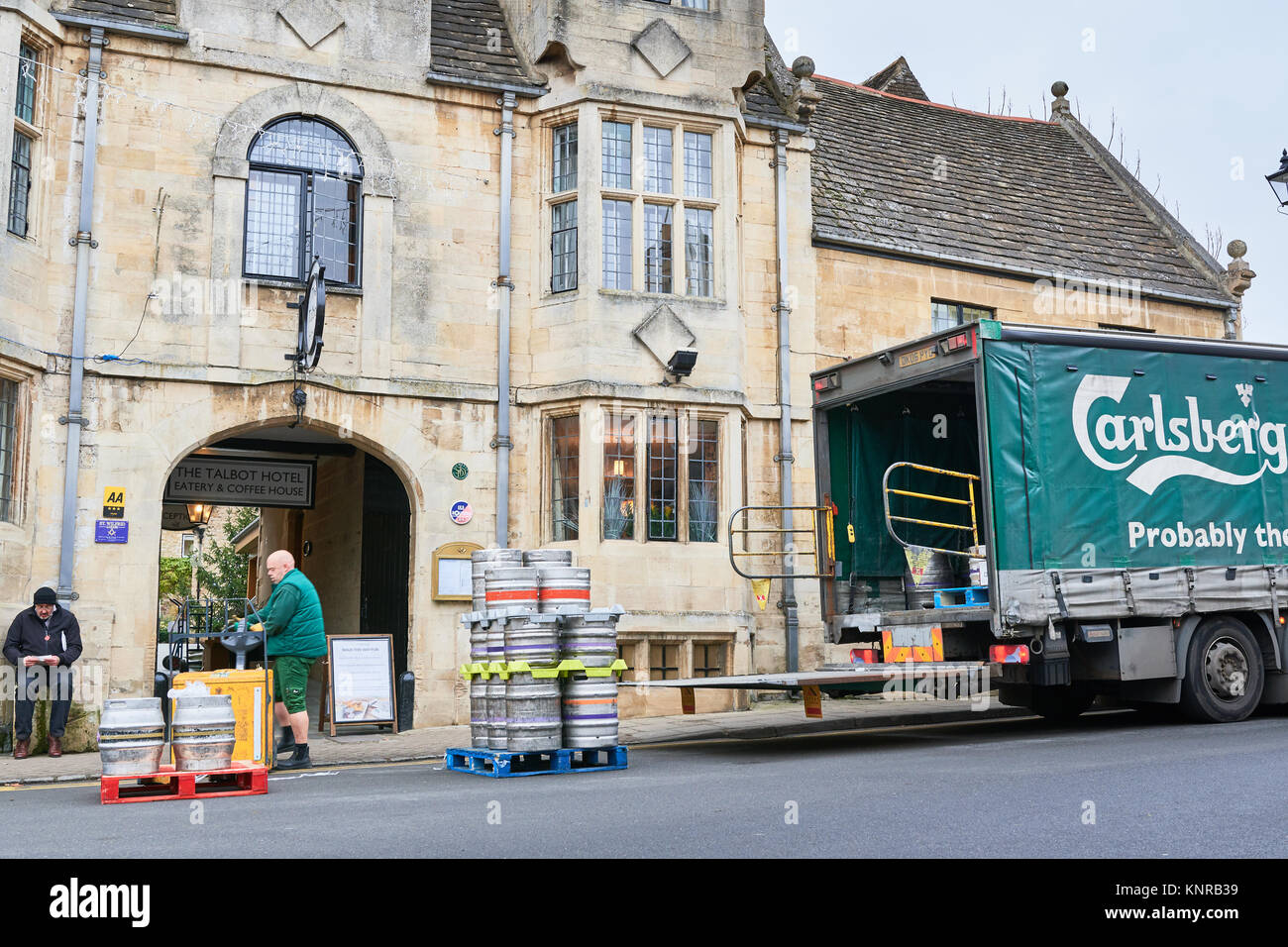 Delivery of kegs of beer from a Carlsberg beer wagon outside the Talbot