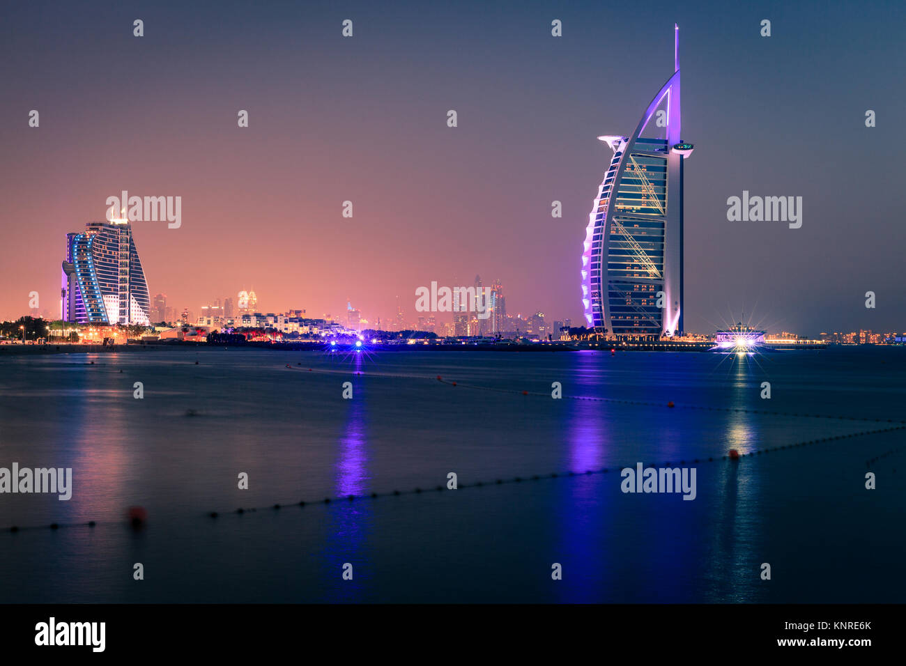 Dubai, UAE, June 7, 2016: view of world's famous Burj Al Arab and Jumeirah Beach hotels at night Stock Photo