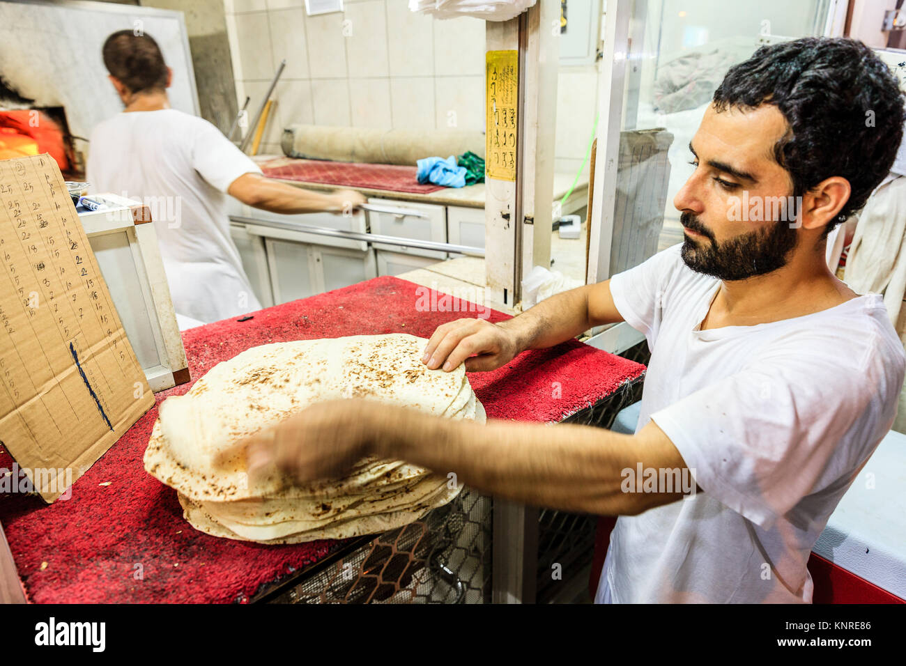 Dubai, UAE, June 14, 2016 Baking traditional arabic flatbread at a