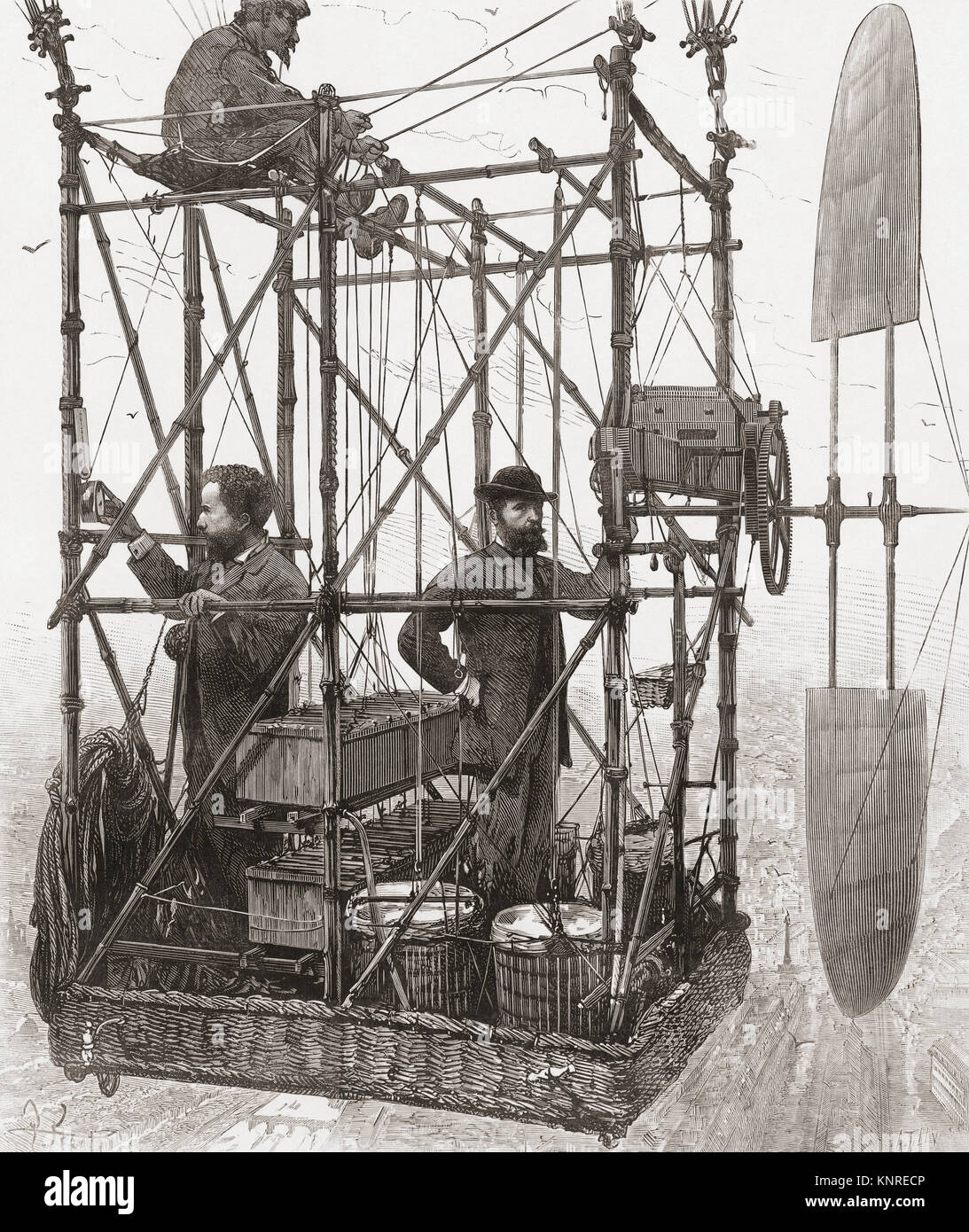 French aviators Albert Tissandier (left) and his brother Gaston Tissandier.  The unidentified man at top is presumably an assistant mechanic.  Albert Tissandier 1839-1906.  Gaston Tissandier 1843-1899. The picture shows the “cockpit” of their 1883 airship which had been fitted with a Siemens electric motor resulting in aviations first electric-powered flight. Stock Photo