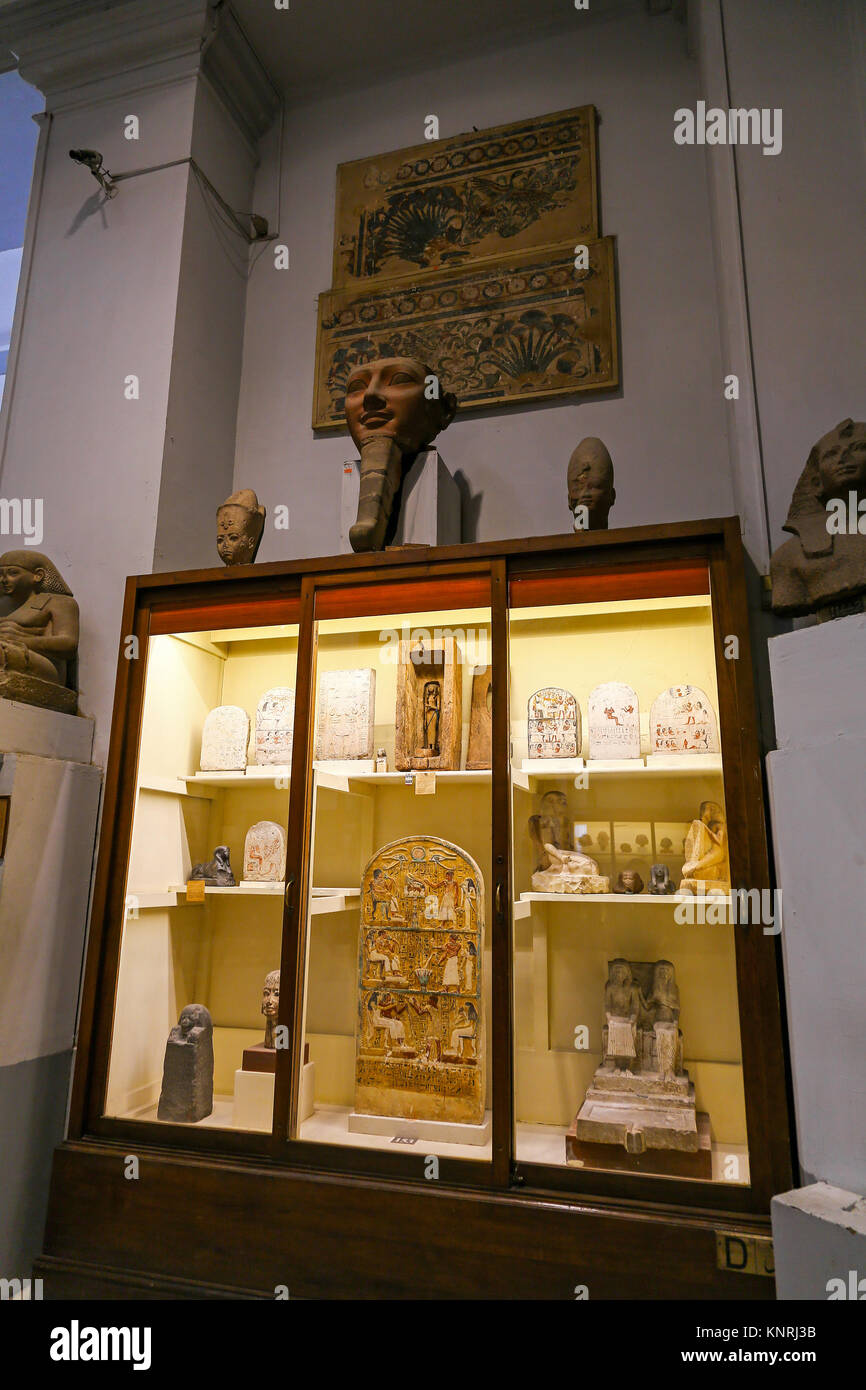 Painted stela and other artefacts of Nebnakhtu and his family in a display  case in the Egyptian Museum of Antiquities, Cairo, Egypt, North Africa  Stock Photo - Alamy