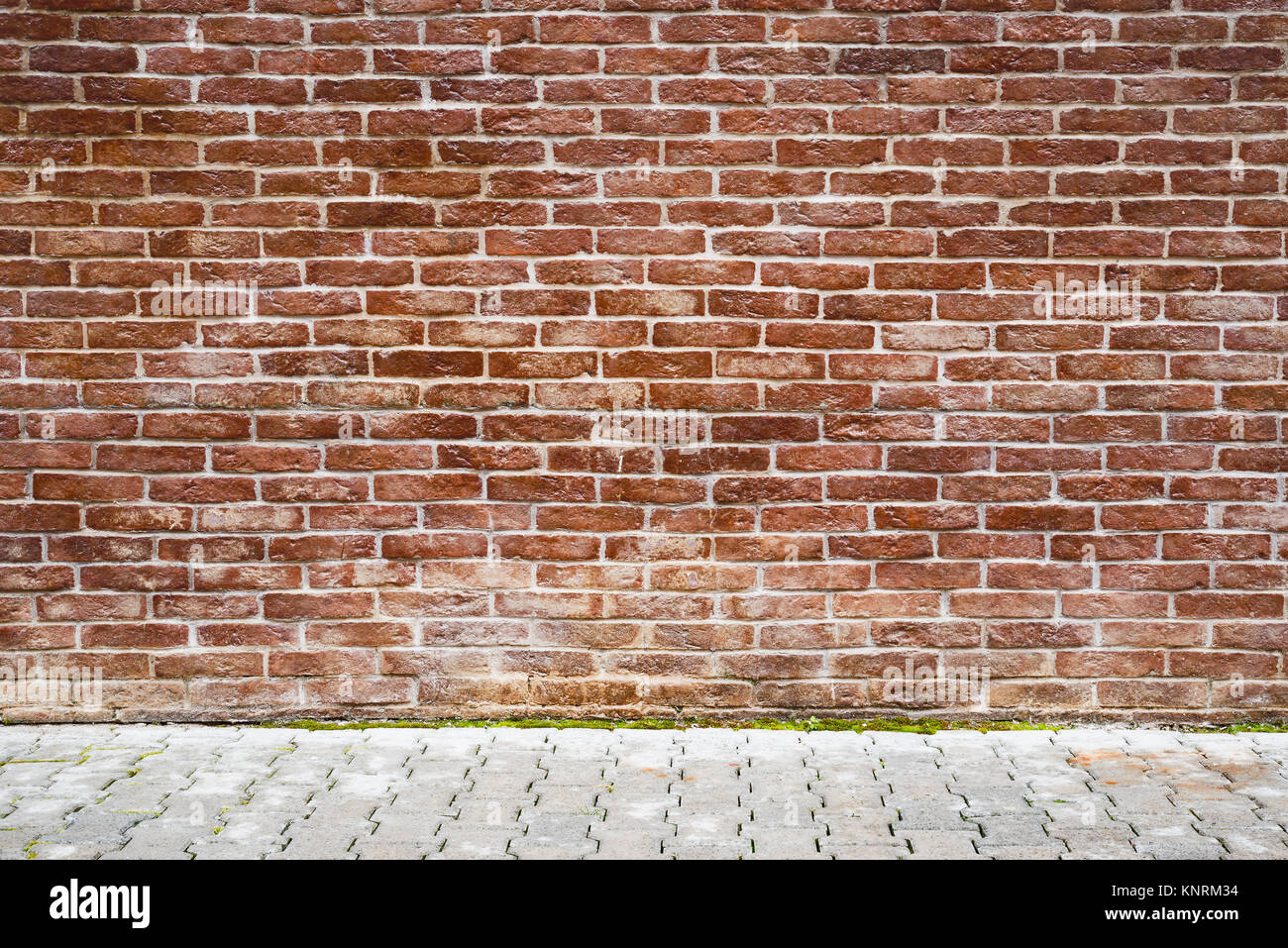 Brown brick wall and stone floor background Stock Photo - Alamy