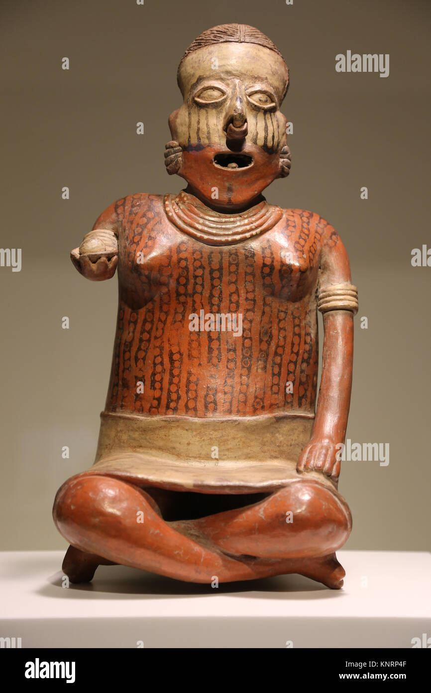 Mesoamerica. Precolombian. Seated figure. Nayarit, Mexico. 100 BC-300 AD. Poterry. Museum of Cutures of the World. Barcelona. Spain Stock Photo