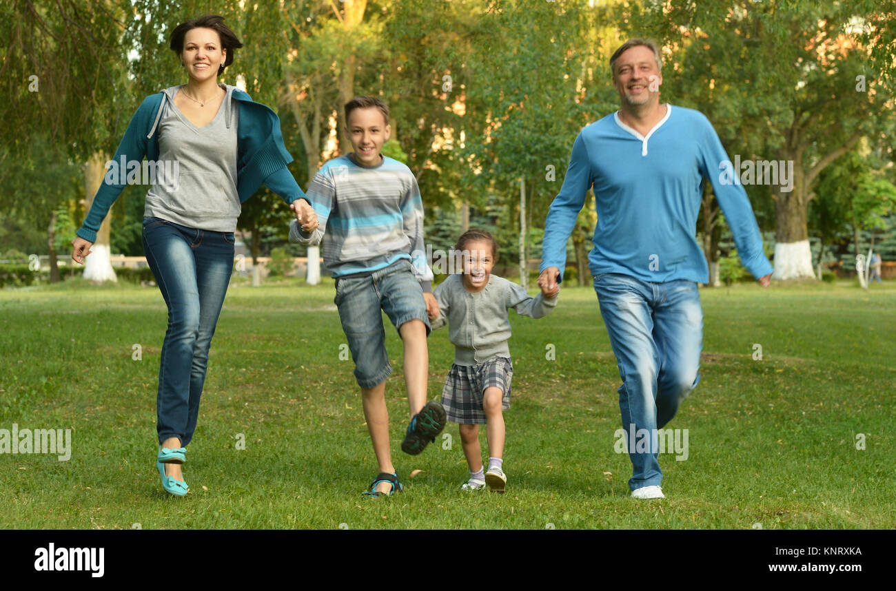 family in the green  summer park Stock Photo