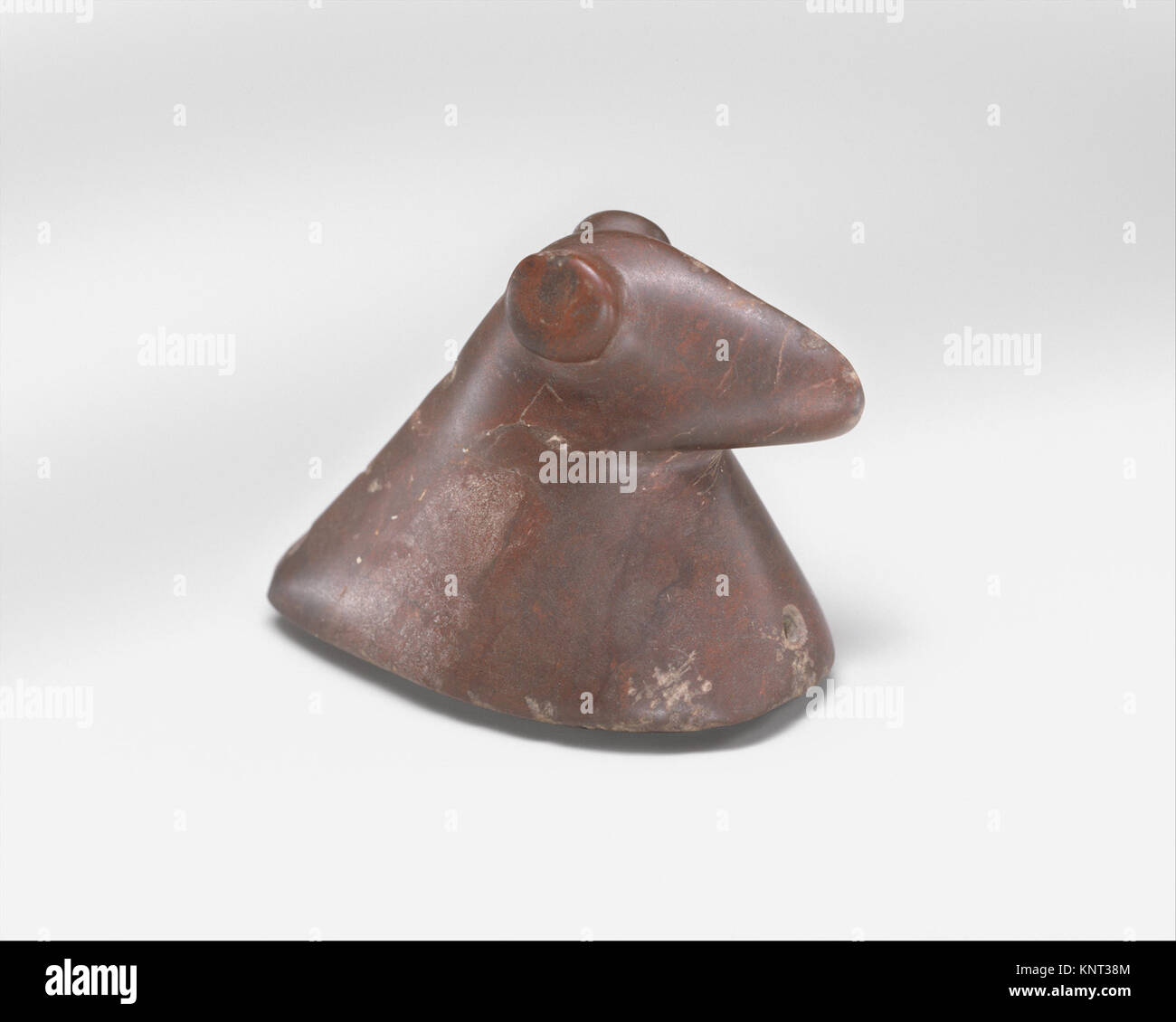A birdstone, a small prehistoric carved stone artifact shaped like a ...