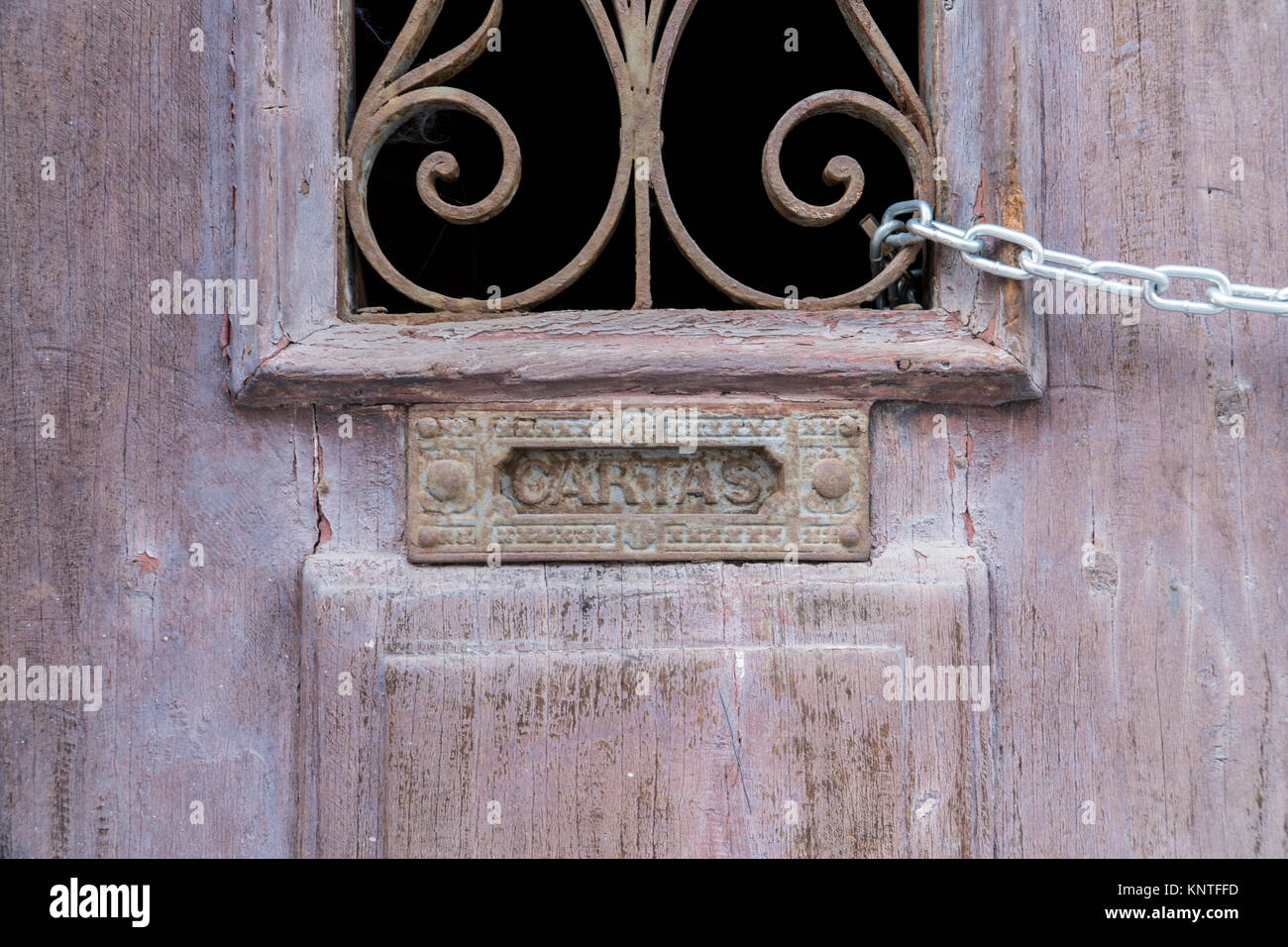 Old Rusty Mailbox With The Word Letters In Spanish Cartas Stock