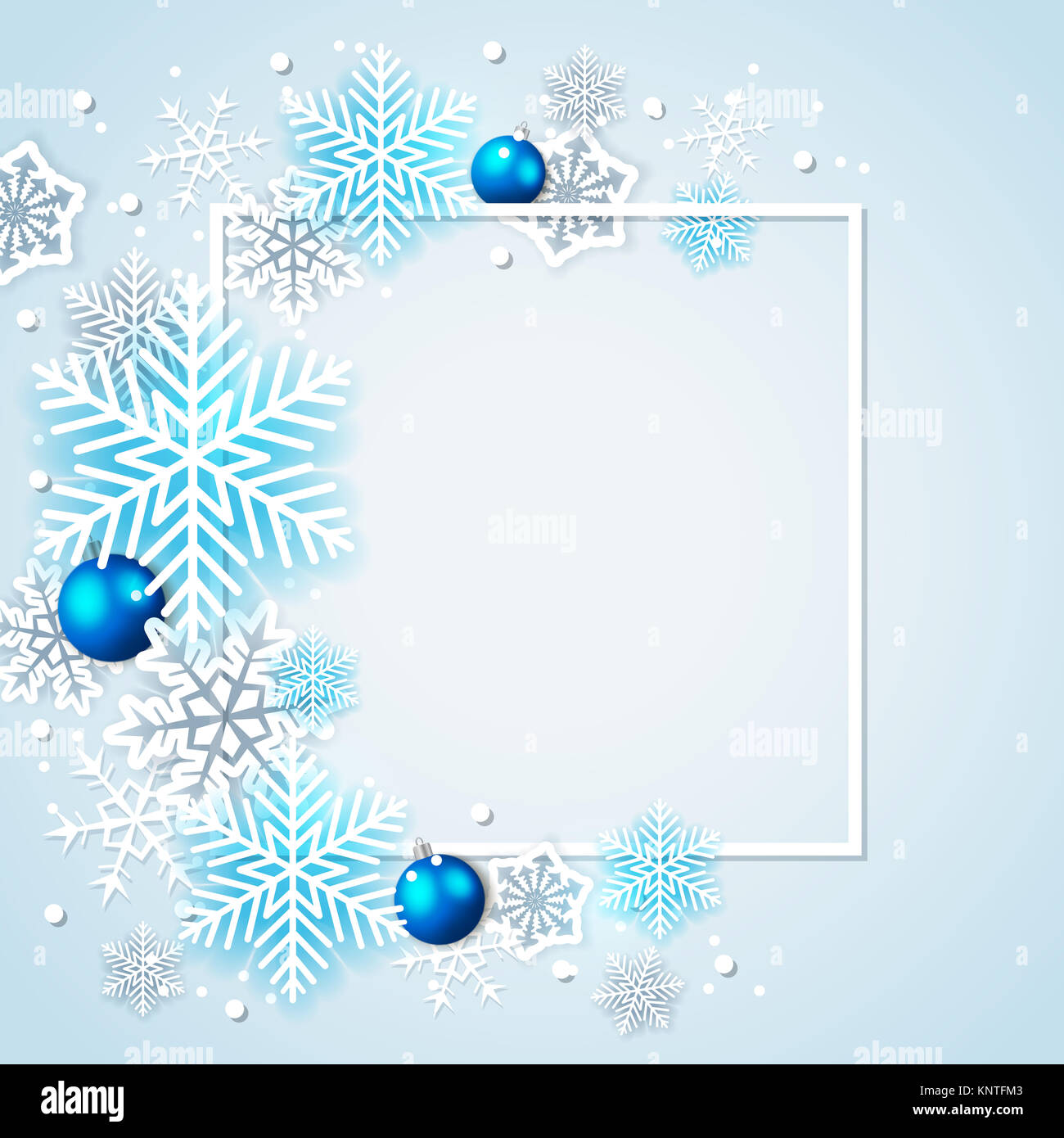 Holiday background with white snowflakes and blue decorations in frame ...