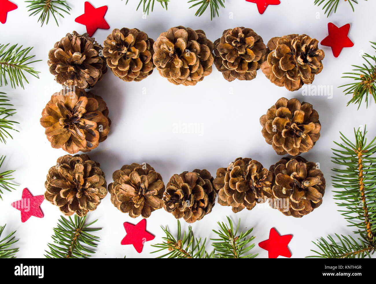 Pine cones festive background with fir branch flat lay Stock Photo - Alamy