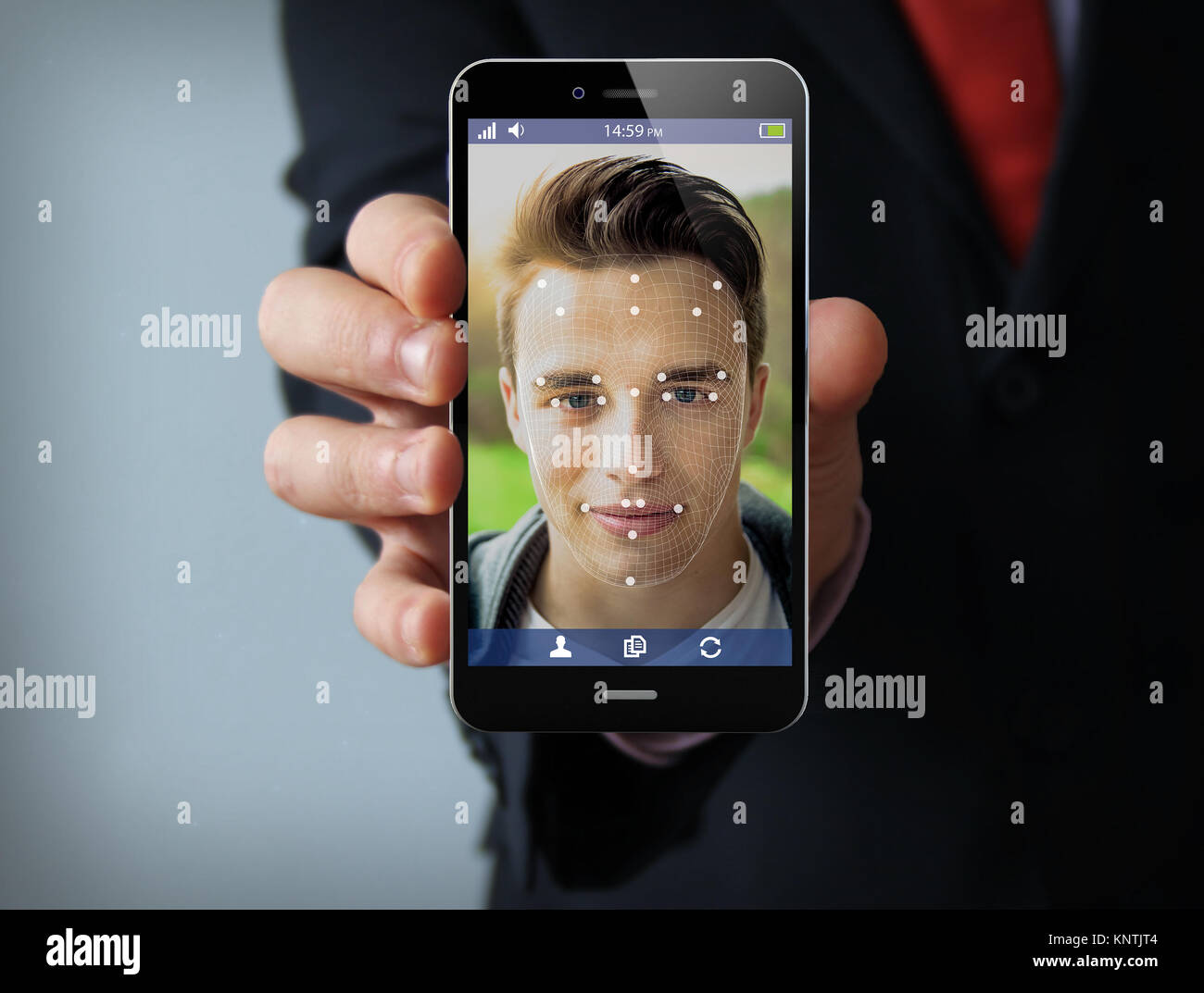 new technologies concept: businessman showing smartphone with face id technology on the screen. Screen graphics are made up. Stock Photo