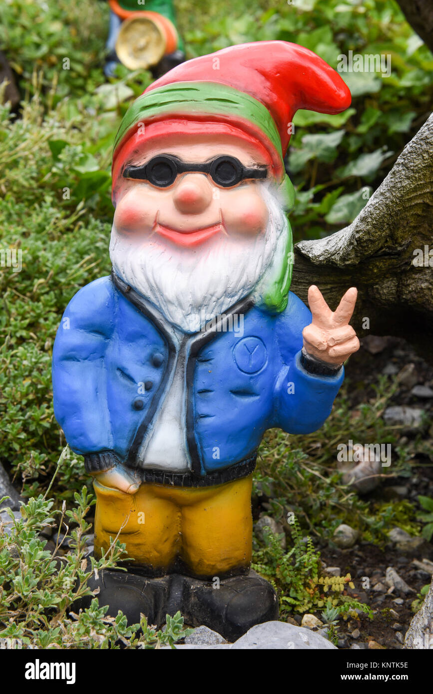 Garden gnome in a garden of a house at Engelberg on the Swiss alps Stock Photo