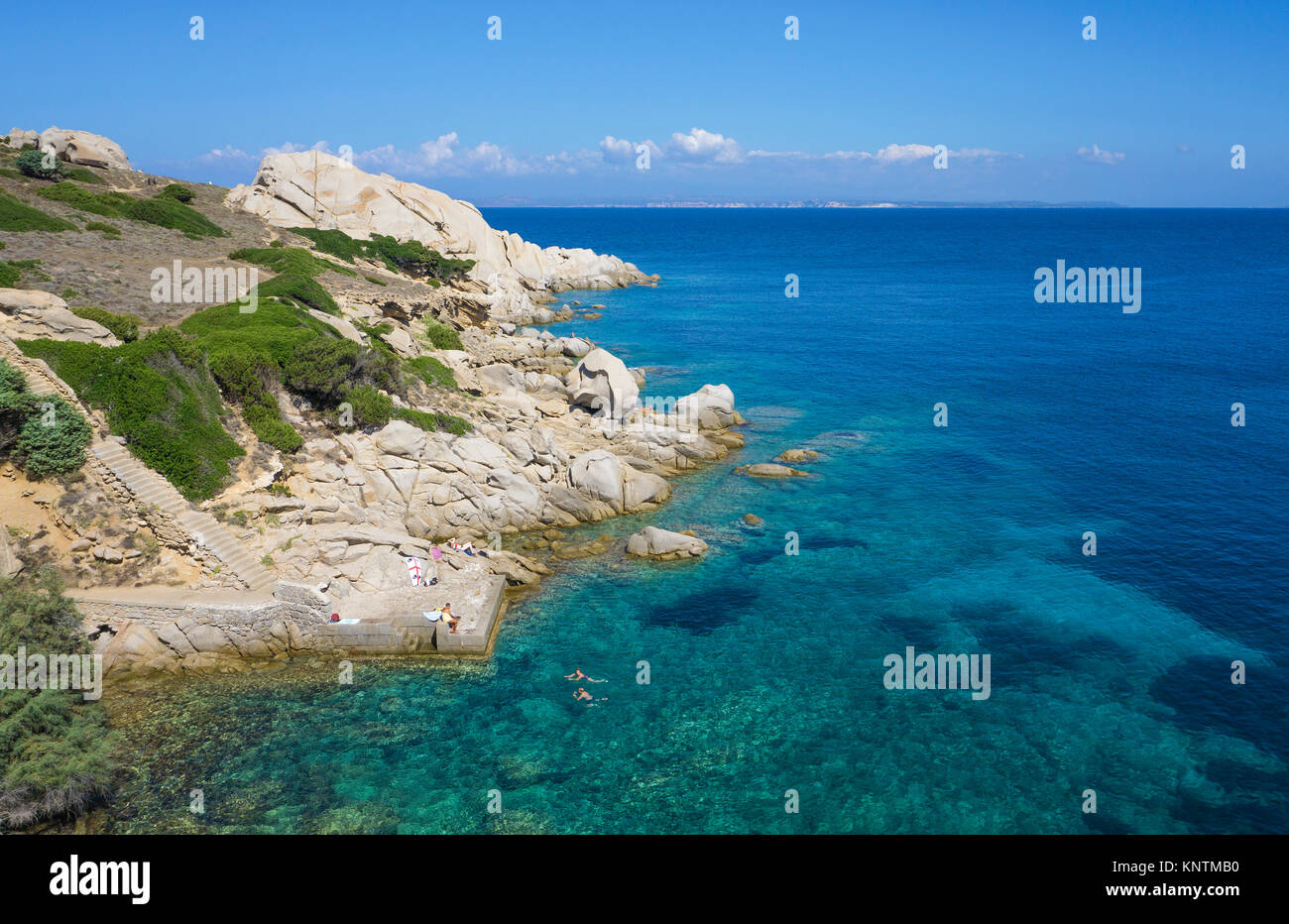 Swimming and snorkling at the rocky coast of Capo Testa, Santa Teresa di Gallura, Sardinia, Italy, Mediterranean sea, Europe Stock Photo