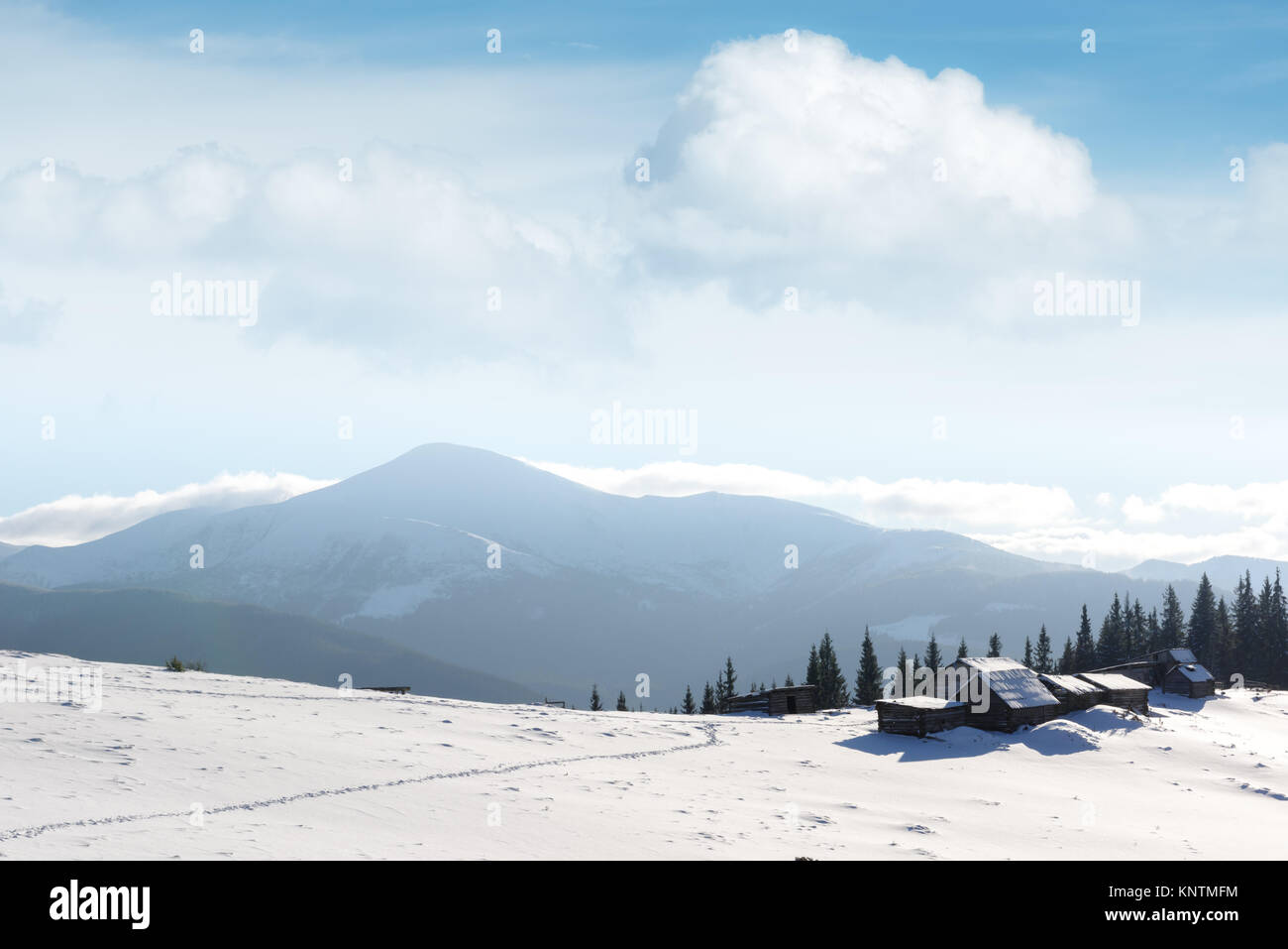 Fantastic landscape with snowy house Stock Photo