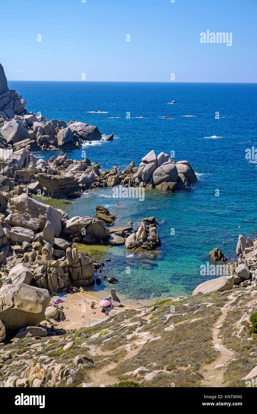 Tiny beach surrounded of granite boulders at Capo Testa, Santa Teresa di Gallura, Sardinia, Italy, Mediterranean sea, Europe Stock Photo