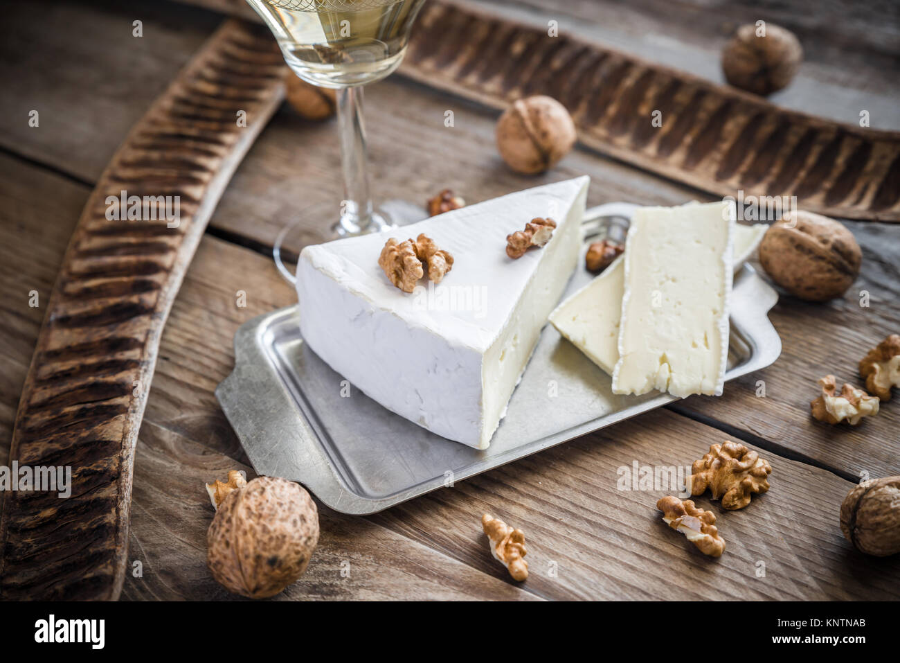 Brie cheese with nuts Stock Photo Alamy
