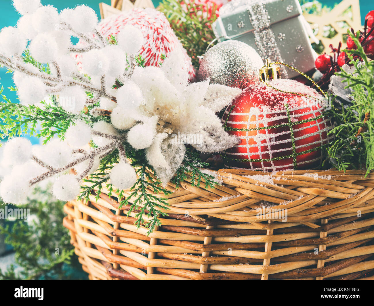Wicker Basket Full Of Christmas Decorations Snow Flakes Stock
