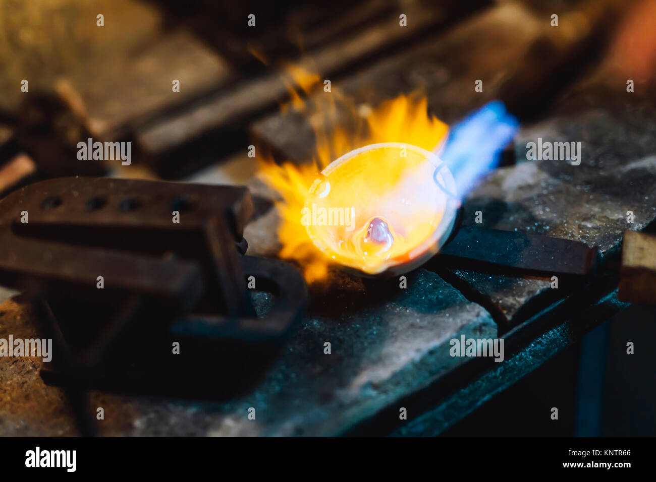 Jeweler melting gold Stock Photo Alamy