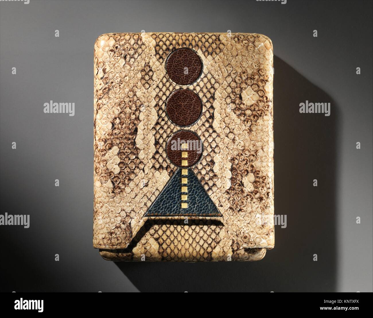 Cigarette Case. Designer: Pierre Legrain (French, Levallois-Perret  1889-1929 Paris); Date: ca. 1925; Medium: Snake skin, dyed and tooled  leather Stock Photo - Alamy