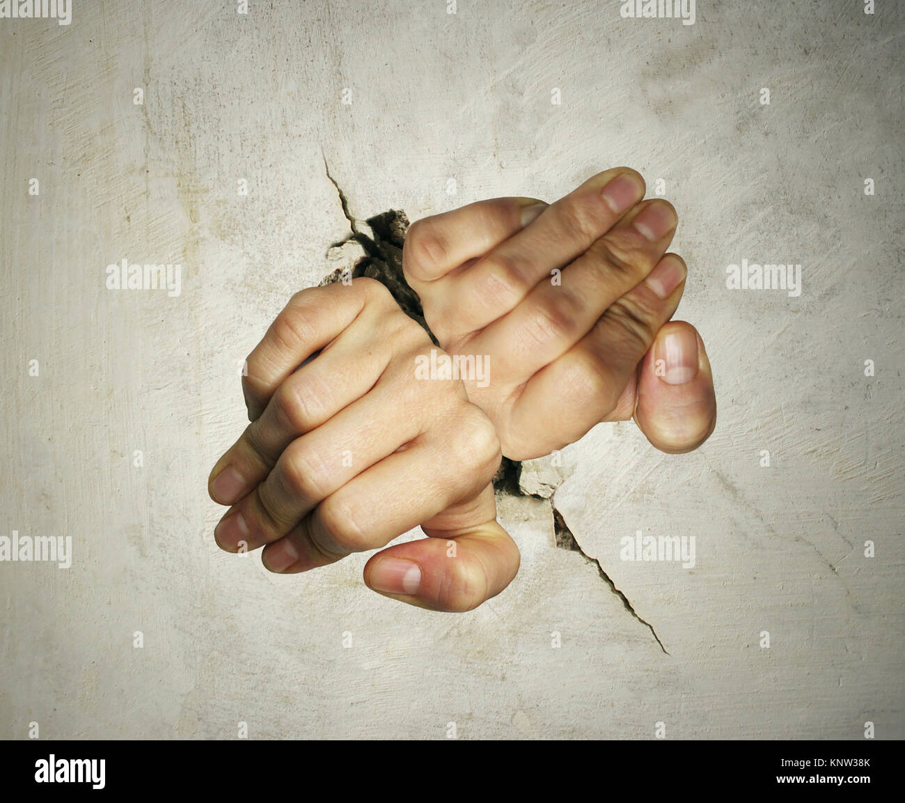 Concept Of Two Hands Trying Hard To Get Out Of Breaking The Wall Stock Photo Alamy Concept Of Two Hands Trying Hard To Get Out Of Breaking The Wall Stock Photo Alamy