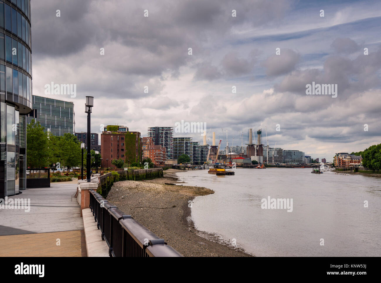 New luxury apartments construction sites and Battersea Power Station along River Thames, London, UK Stock Photo