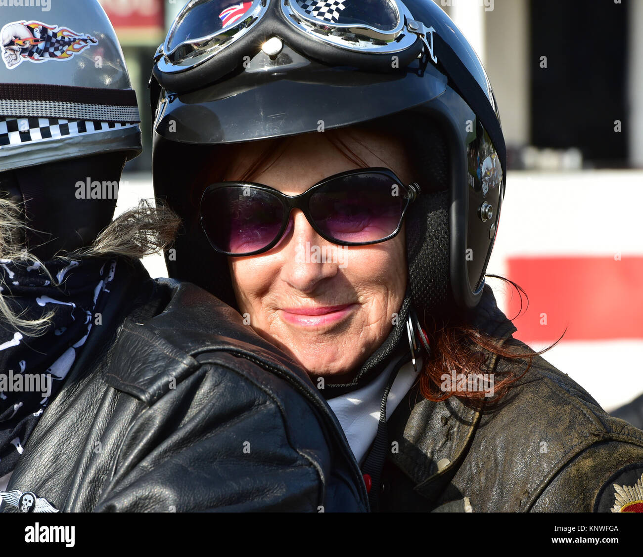 Lady biker, Goodwood Revival 2014, Goodwood, Goodwood Revival 2014, Goodwood Transport Corps, lady biker, motorcycles, rockers. Stock Photo