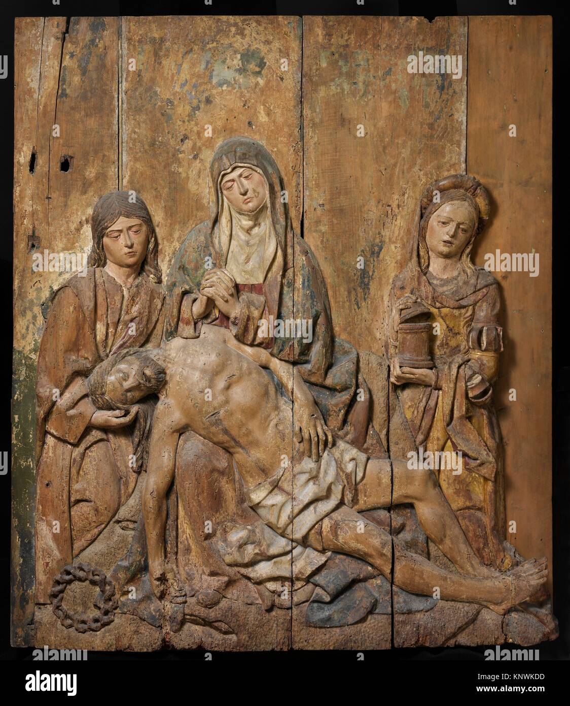 Pietà (Lamentation). Date: early 16th century; Culture: French; Medium: Wood, paint and gilding; Dimensions: Overall: 63 3/4 x 55 3/16 x 6in. (161.9 Stock Photo