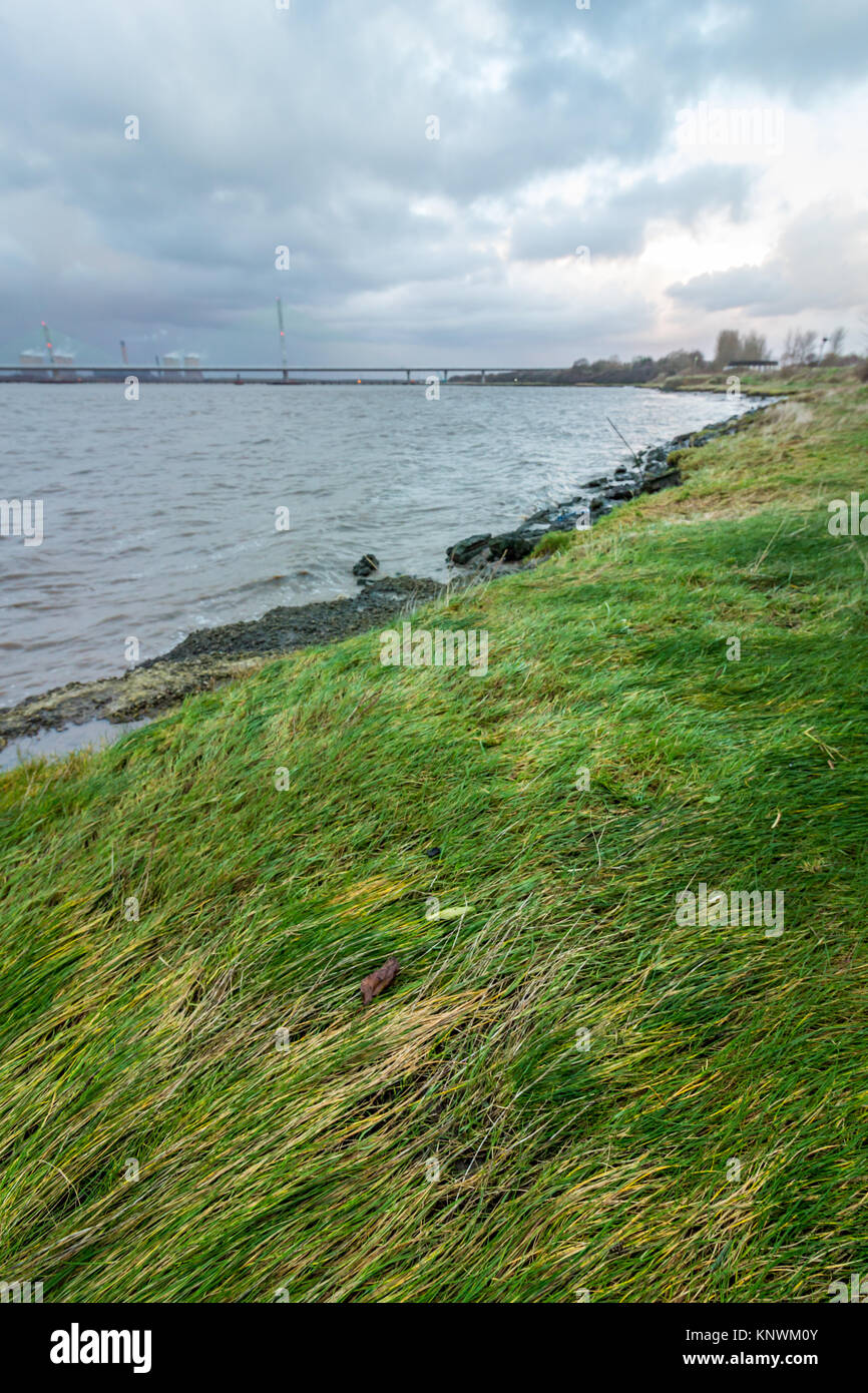 Looking out across the River Mersey at the old Runcorn Silver Jubilee Bridge and the new Mersey Gateway Bridge Stock Photo