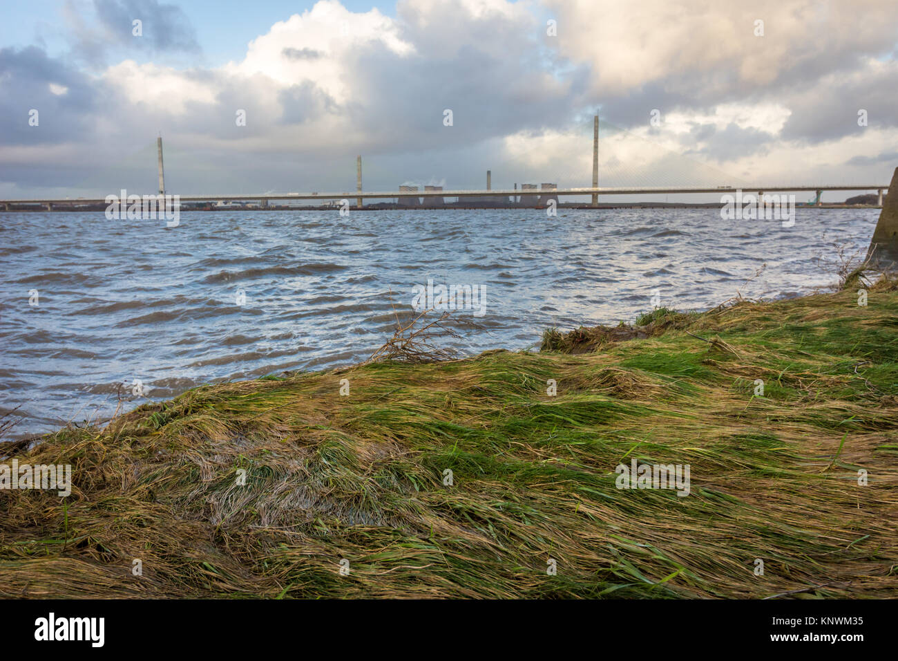 Looking out across the River Mersey at the old Runcorn Silver Jubilee Bridge and the new Mersey Gateway Bridge Stock Photo