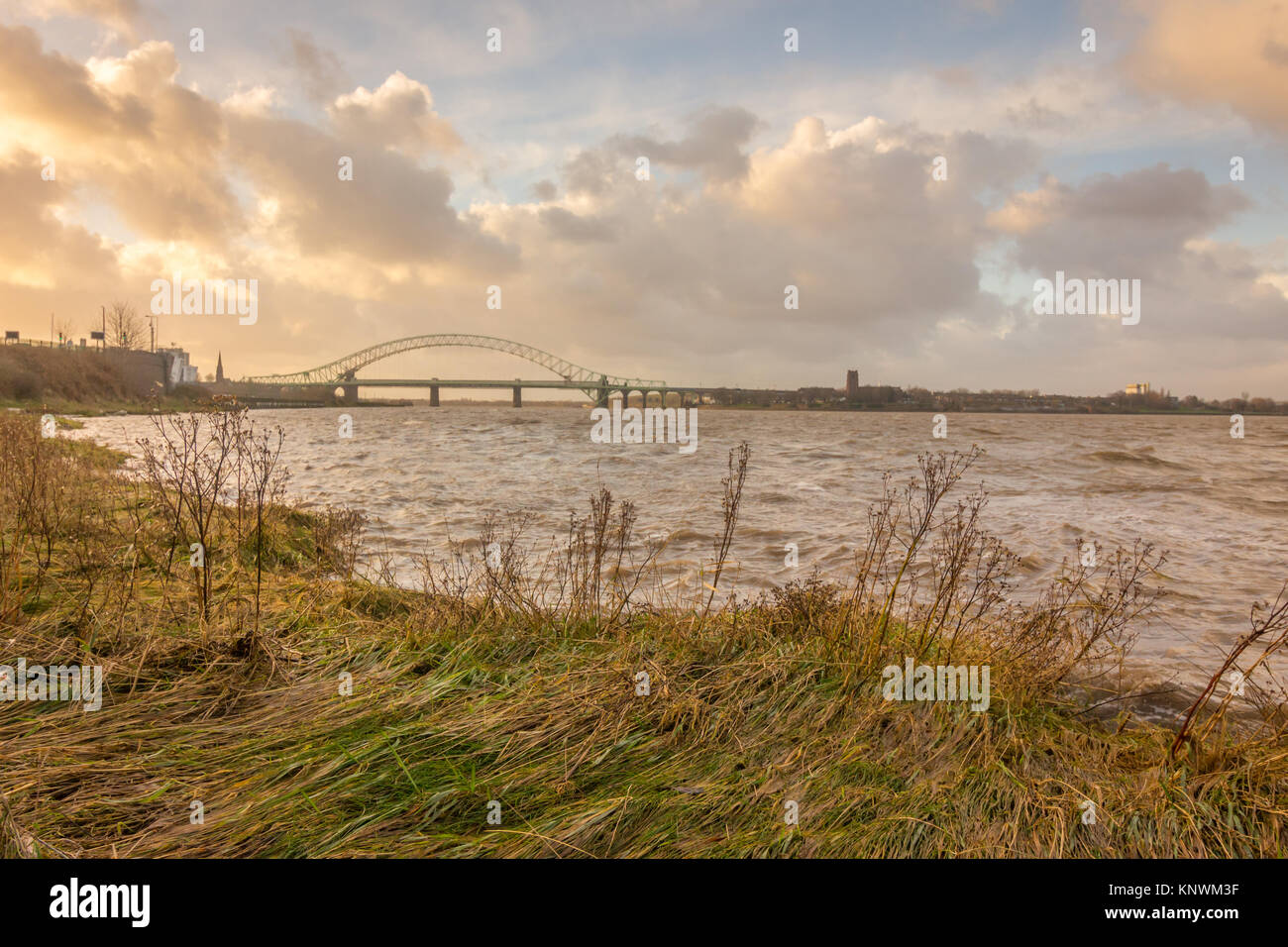 Looking out across the River Mersey at the old Runcorn Silver Jubilee Bridge and the new Mersey Gateway Bridge Stock Photo