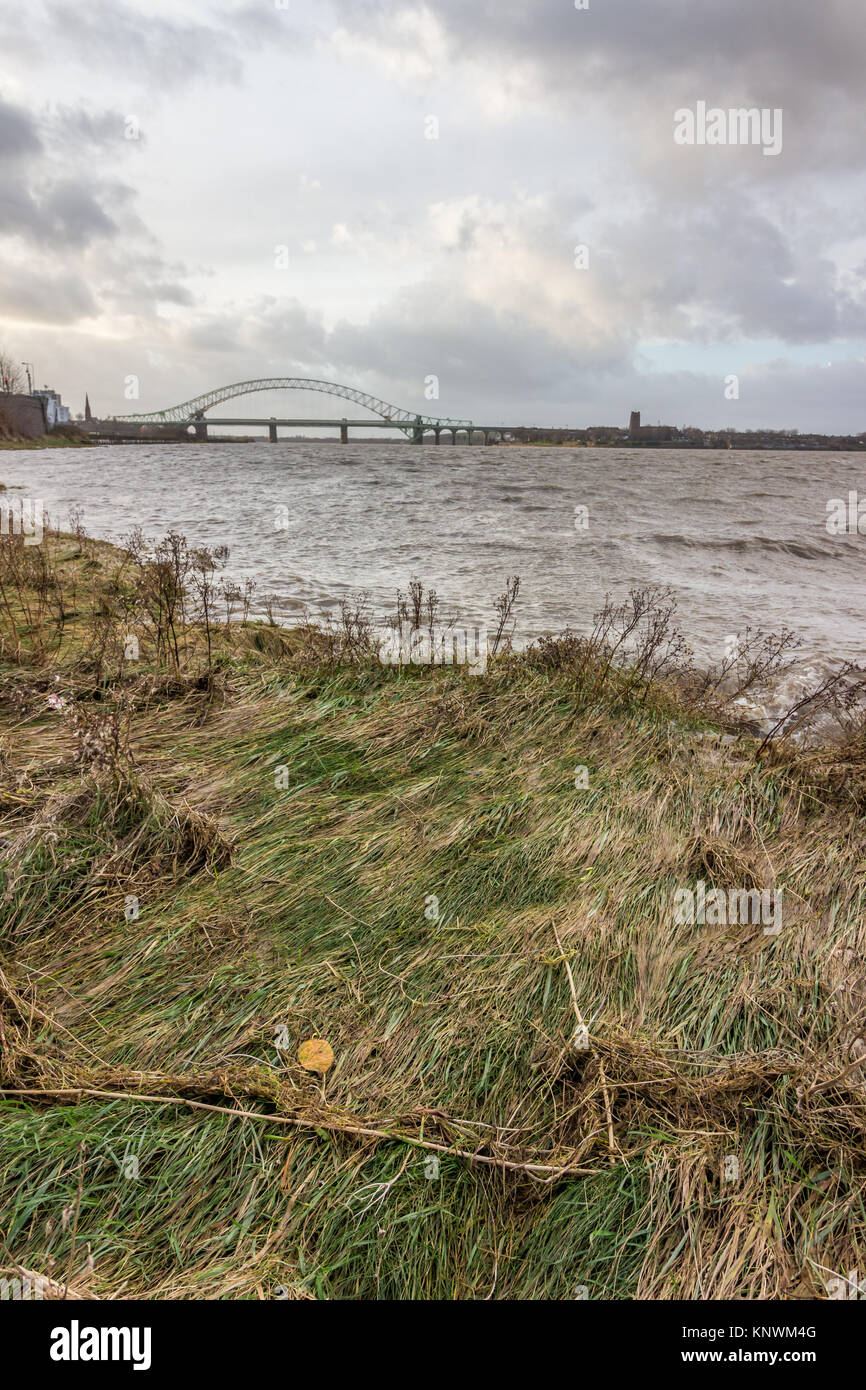 Looking out across the River Mersey at the old Runcorn Silver Jubilee Bridge and the new Mersey Gateway Bridge Stock Photo