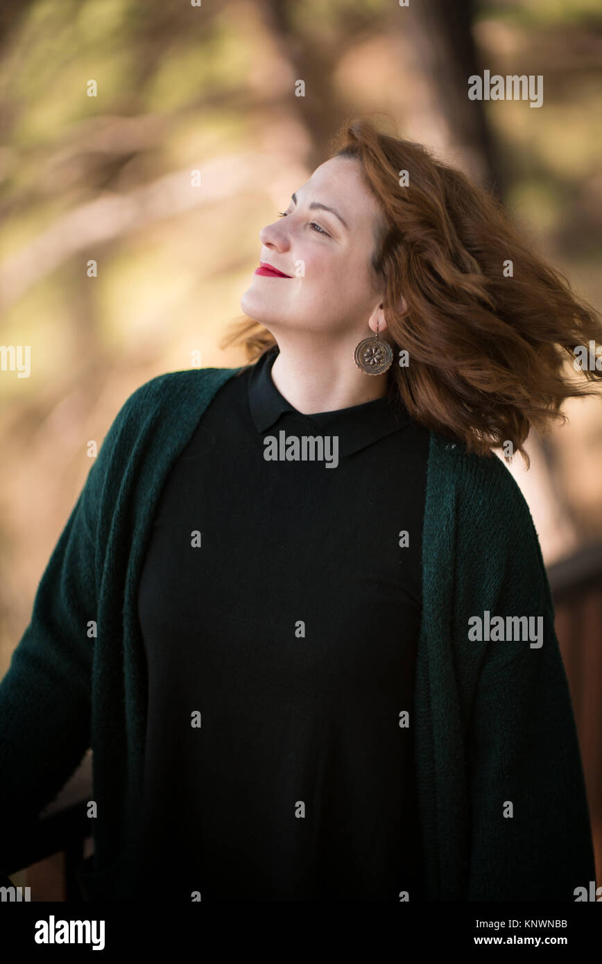 Portrait of Woman with Brown Hair Smilling Stock Photo - Alamy