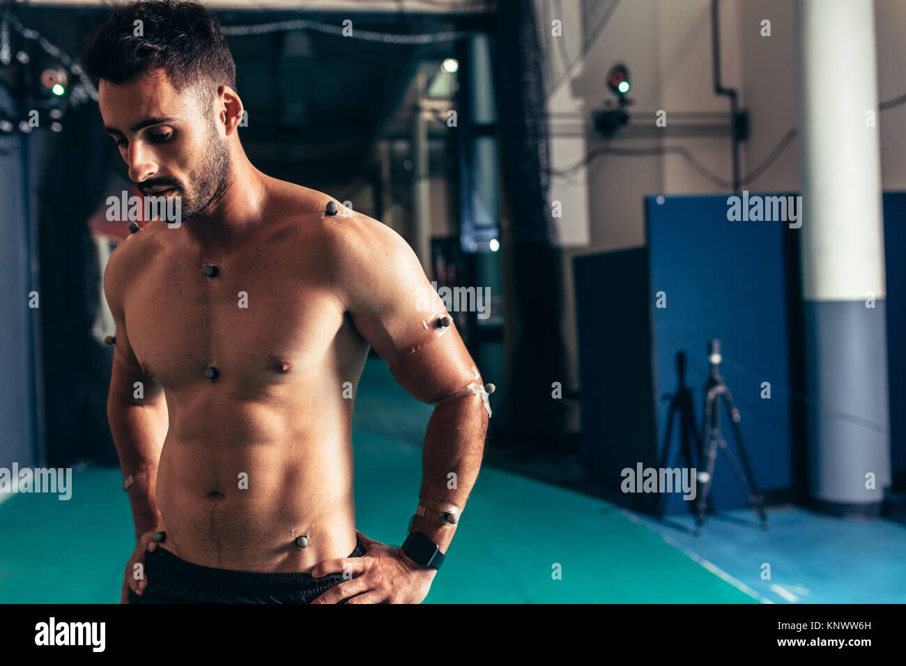 Sportsman with motion capture sensors on body to measure the movement