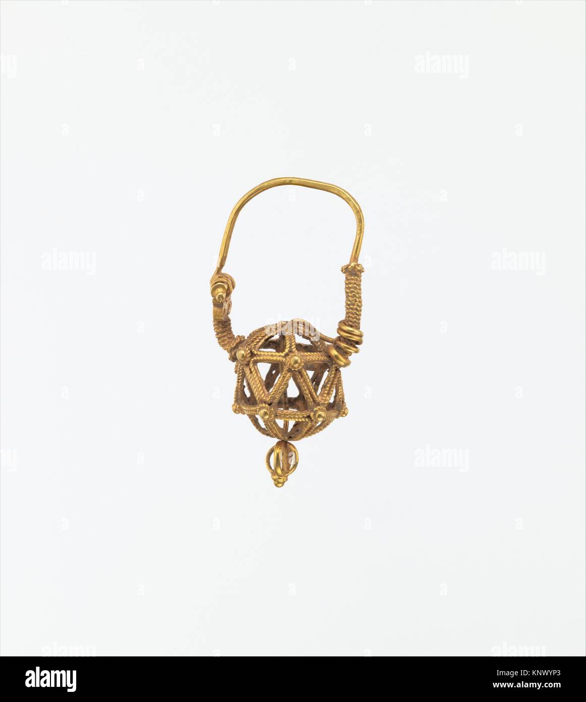 Earring. Date: first half 11th century; Geography: Attributed to Iran; Medium: Gold; filigree and granulation; Dimensions: H. 3.2cm; Classification: Stock Photo