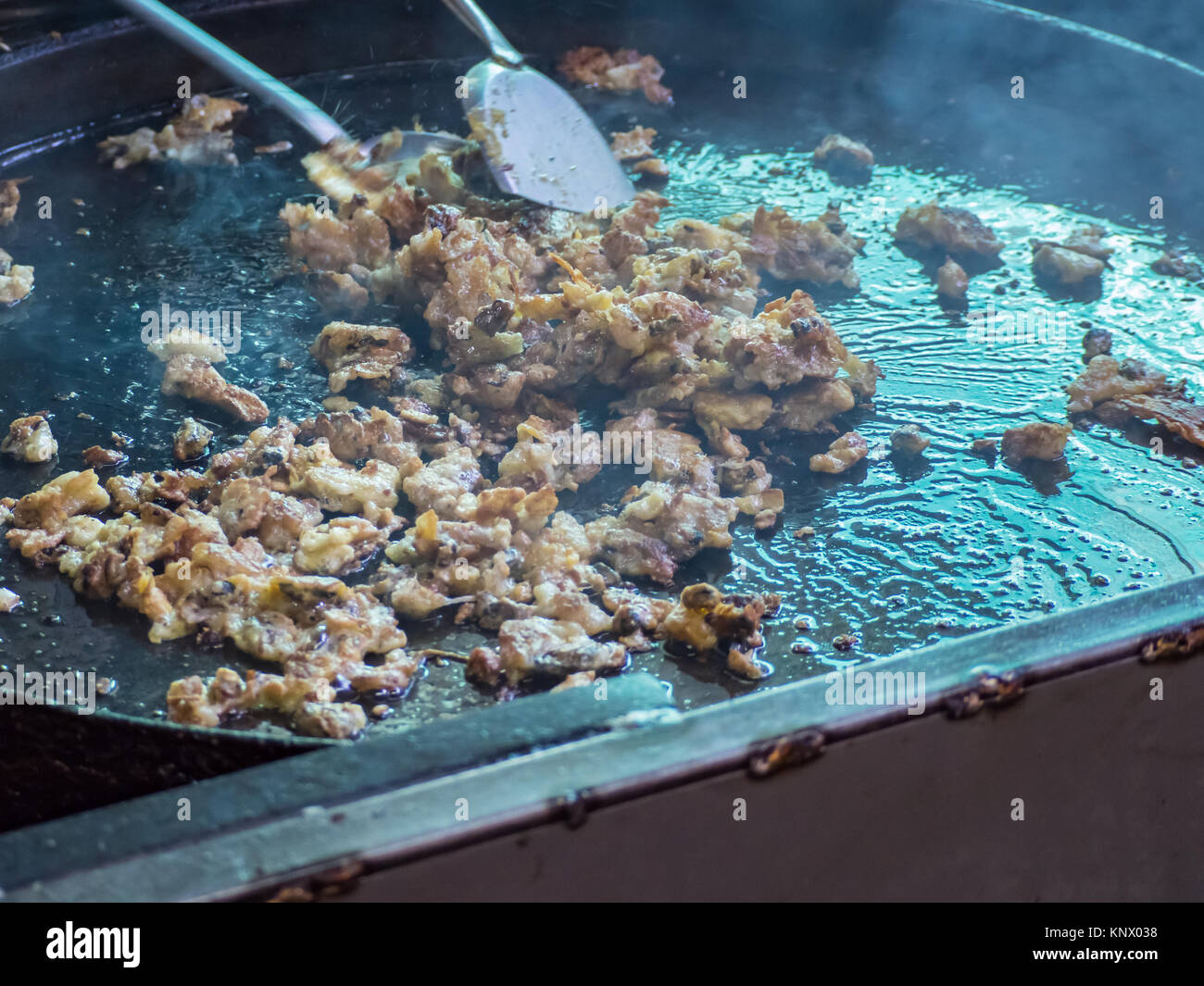 Crisp fried mussel pancakes, mussel fried in egg batter omelette, Hoi Tod. Stock Photo