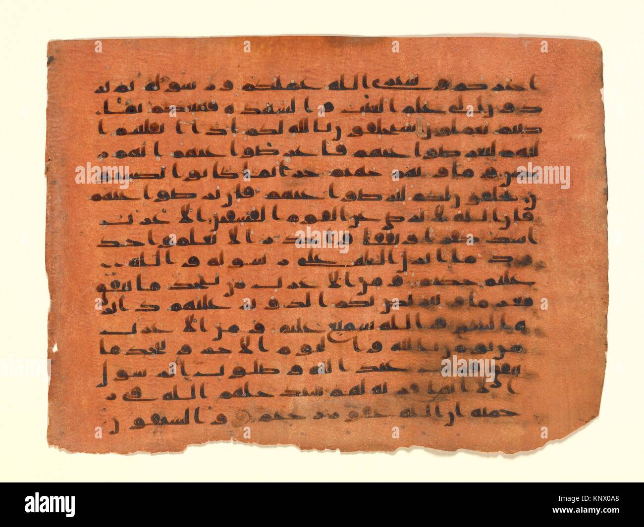 Folio from a Qur´an Manuscript. Object Name: Folio from a non-illustrated manuscript; Date: probably 9th century; Geography: Attributed to Central Stock Photo