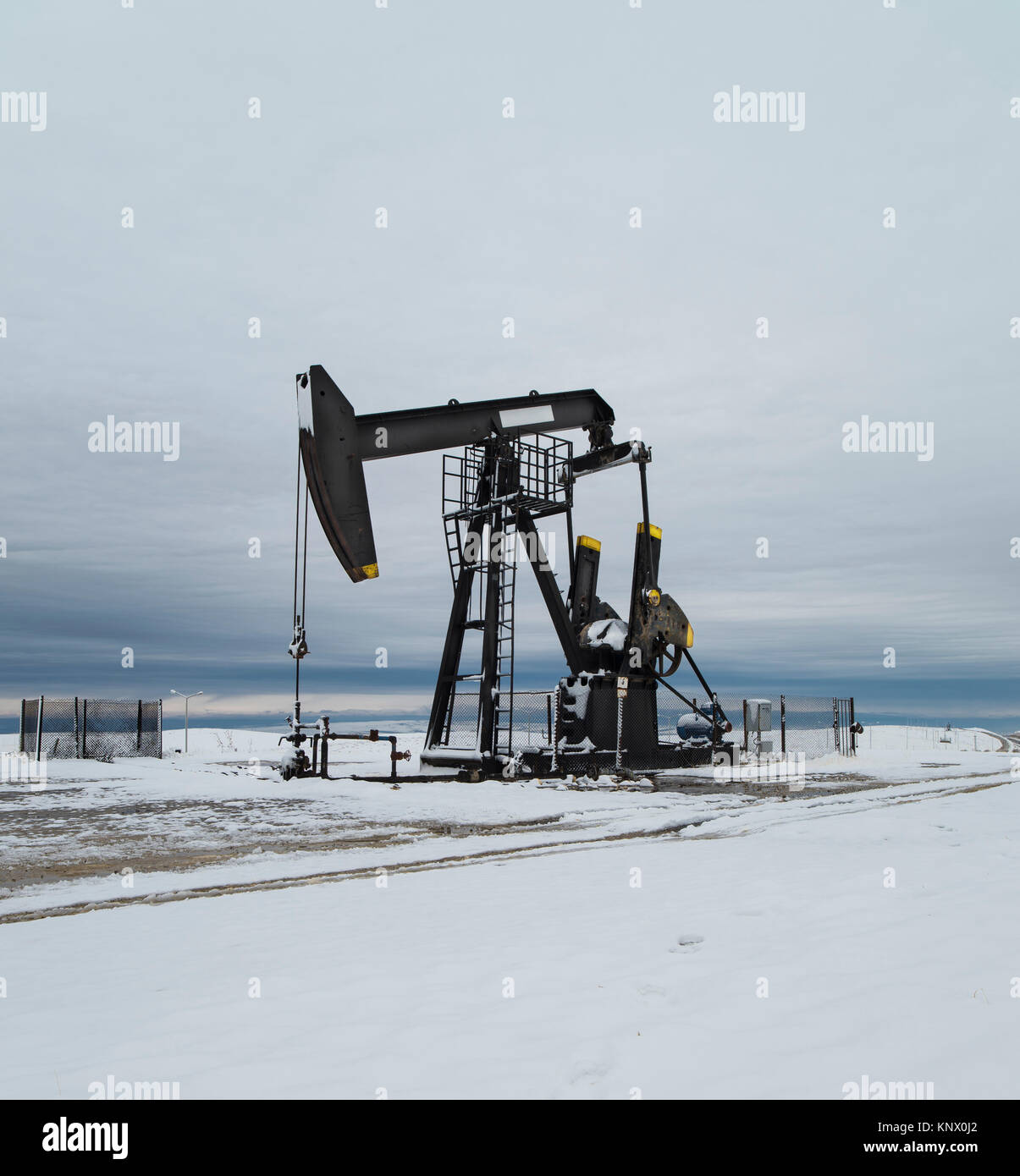 Oil pumps. Oil industry equipment. Winter scene Stock Photo